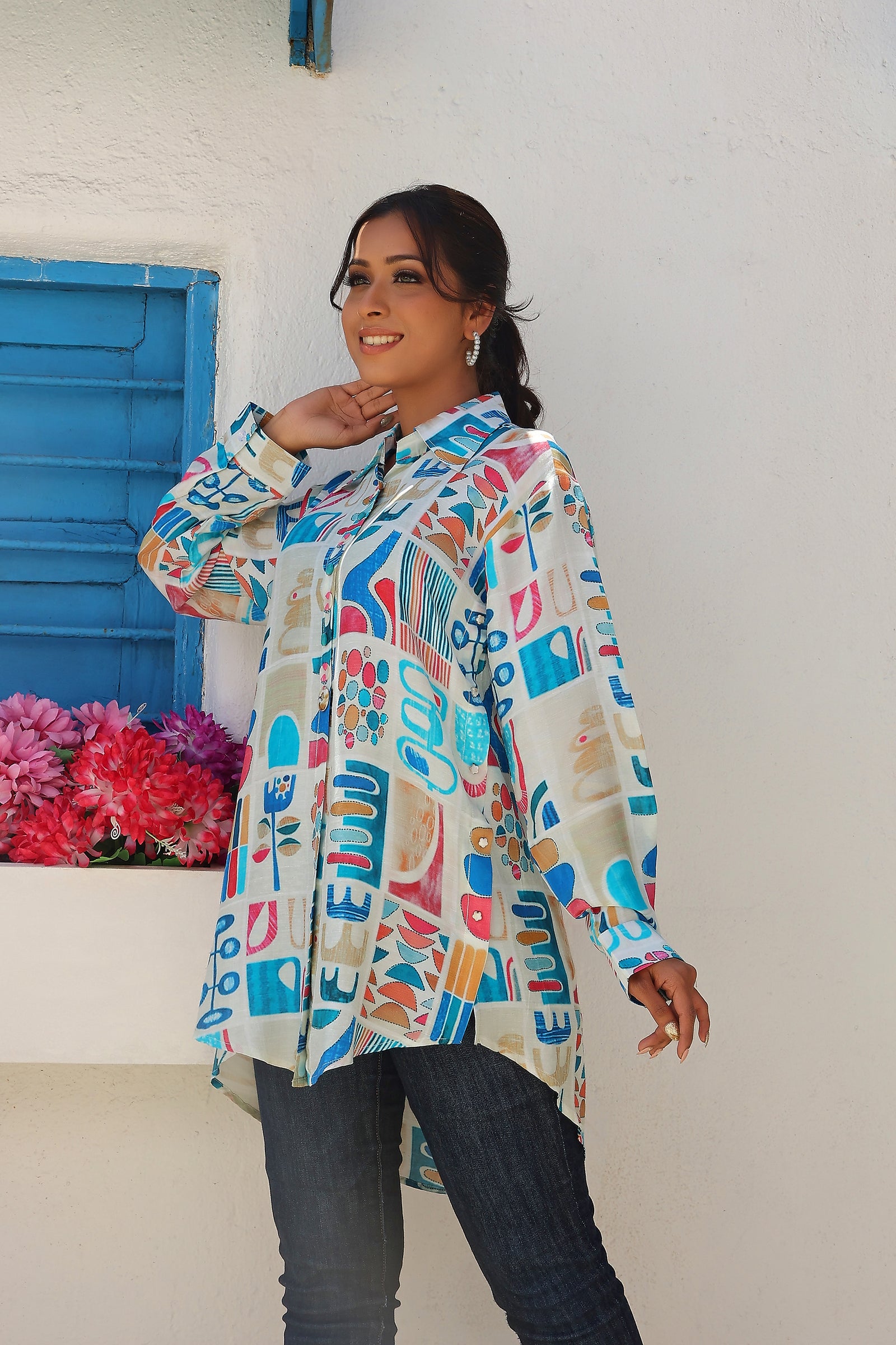 Printed Tunic Has A Spread Collar Full Sleeves With Cuffs Button Closure High Low Hem
