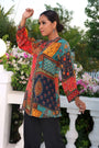 Printed Tunic Has A Mandarin Collar 3/4th Balloon Sleeves Button Closure