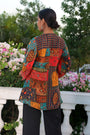Printed Tunic Has A Mandarin Collar 3/4th Balloon Sleeves Button Closure