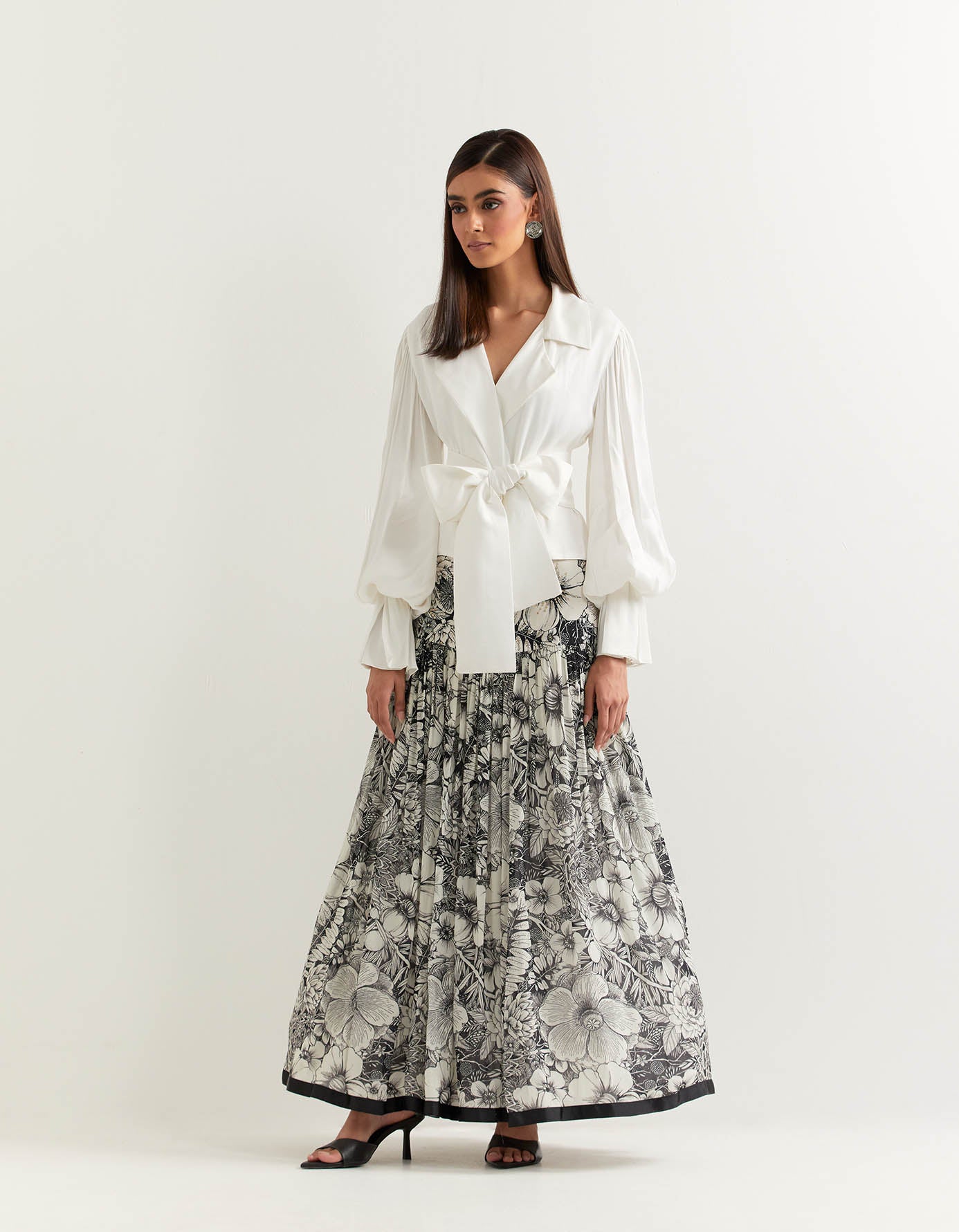 Lantern sleeve notch collar satin top paired with printed georgette skirt