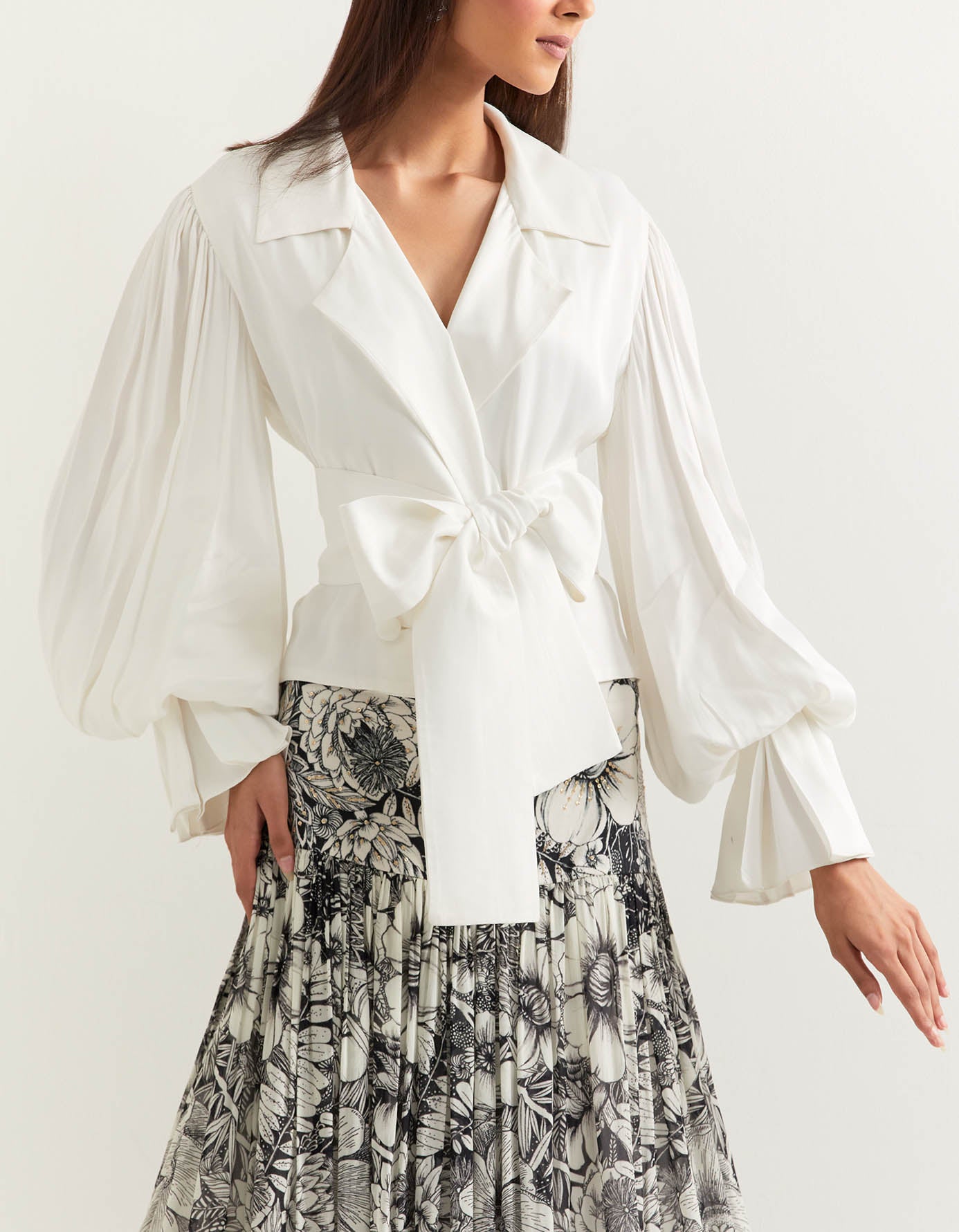 Lantern sleeve notch collar satin top paired with printed georgette skirt