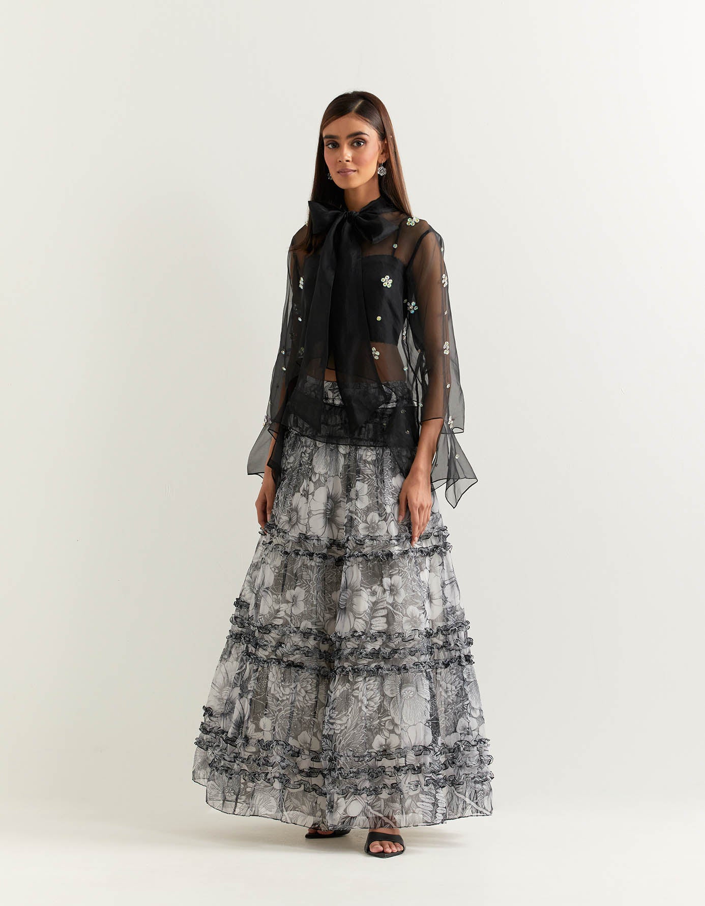 Peplum organza embellished top paired with tiered georgette printed skirt