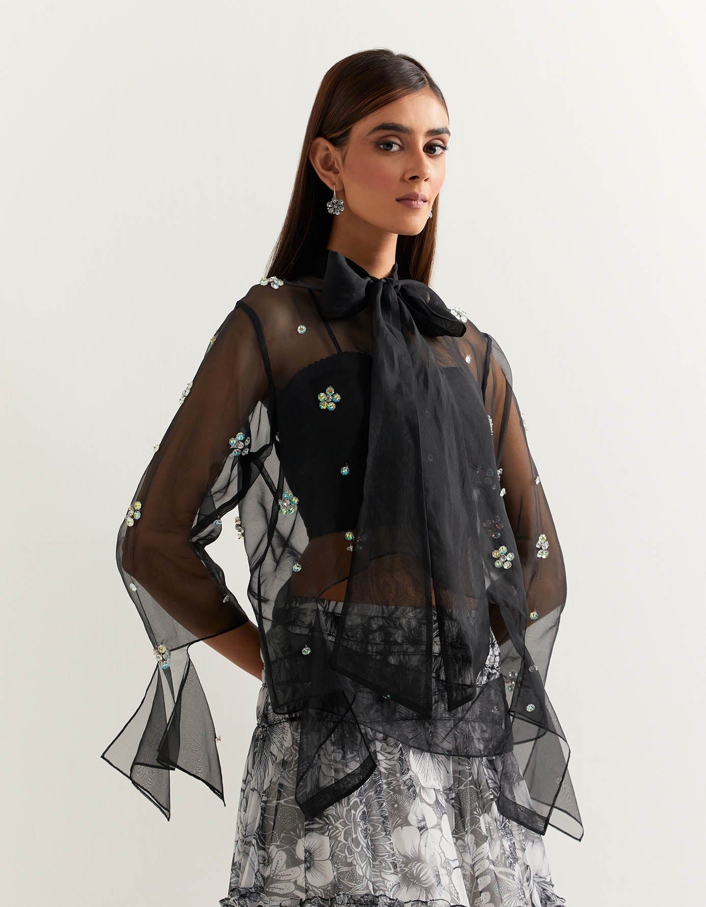 Peplum organza embellished top paired with tiered georgette printed skirt