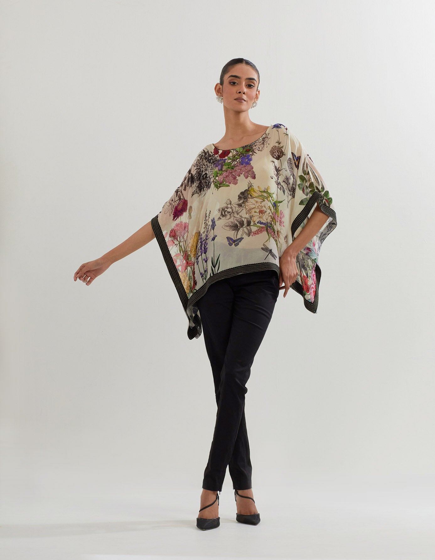 Botanical printed kaftan top paired with stretch lycra black pants