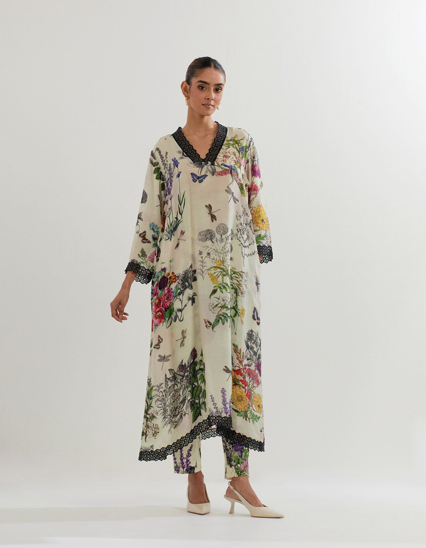 Botanical silk kurta with resham embroidered details paired with printed pants