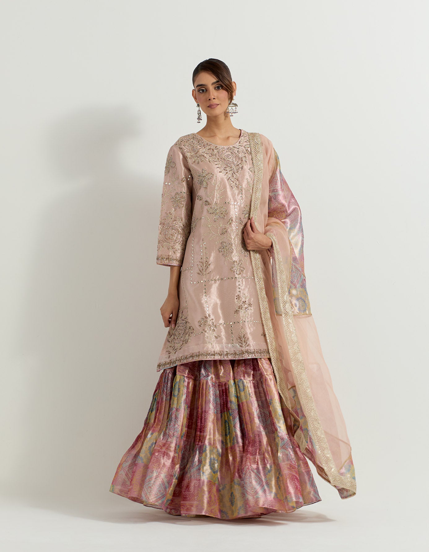 Tissue hand embellished long tunic paired with tissue bandhini printed pleated sharara and organza and tissue patch work dupatta