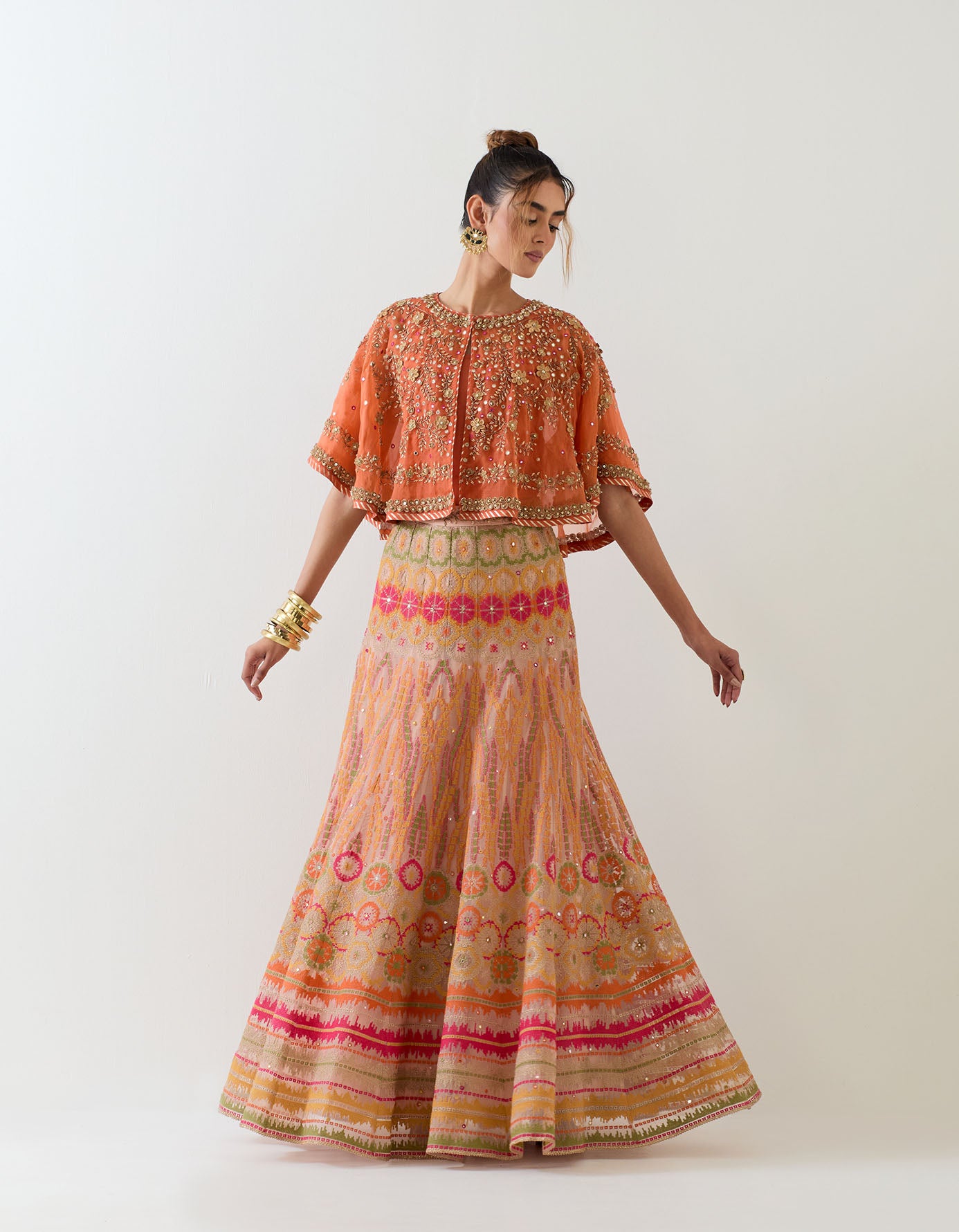 Organza circular cape in exquisite hand embroidery paired with cross stitch organza skirt