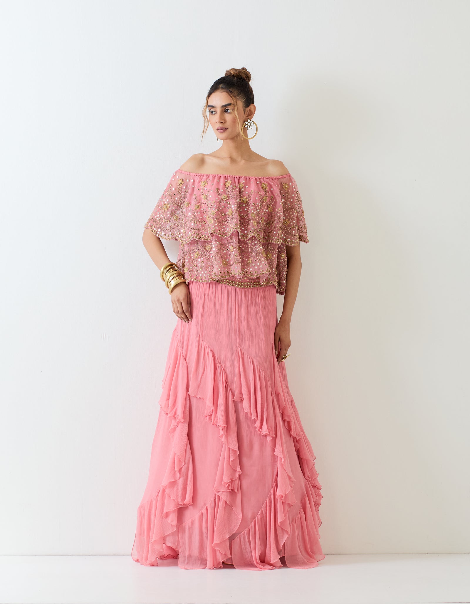 Off shoulder organza hand embellished cape paired with chiffon ruffle skirt