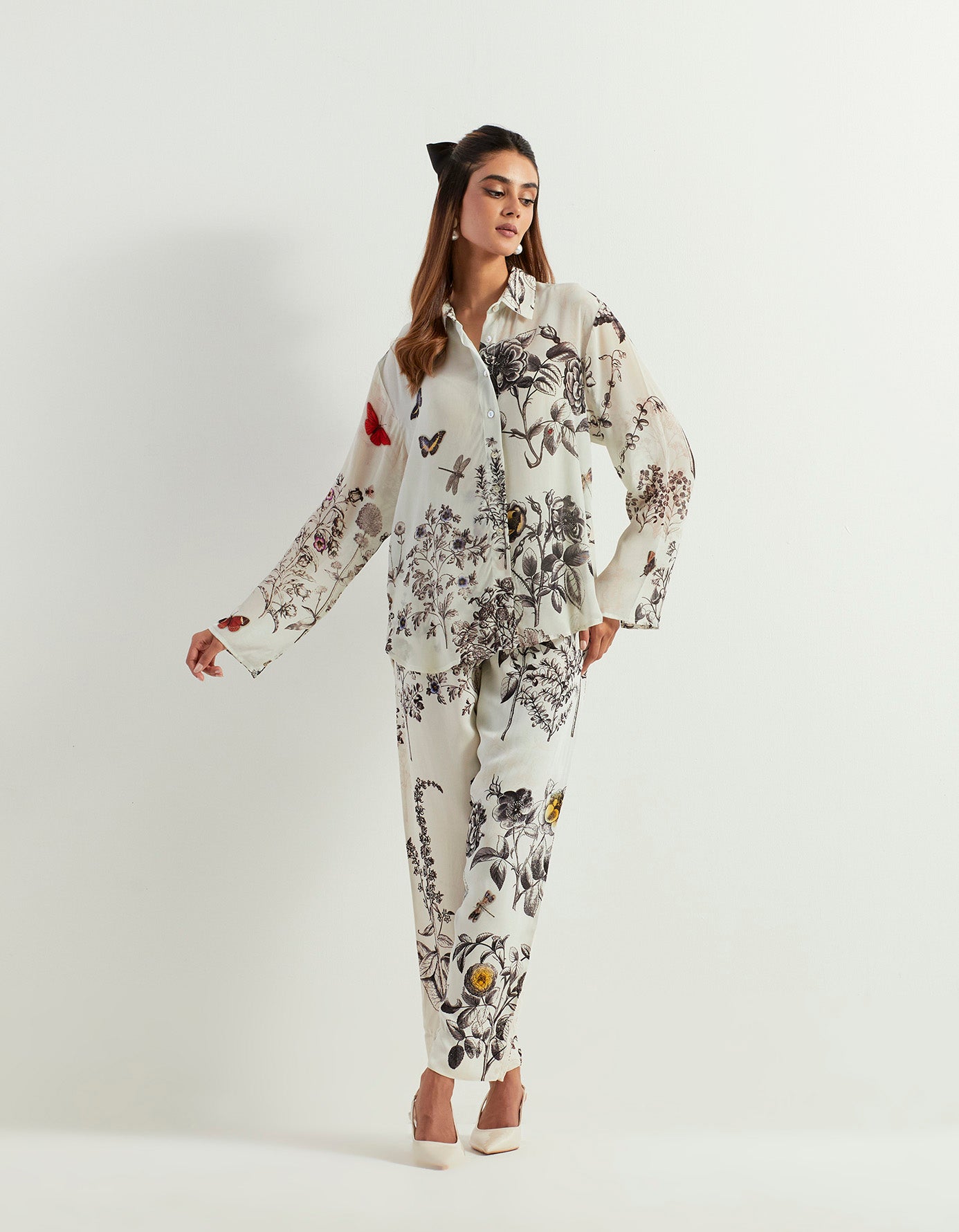 Saaya printed shirt paired with heavy georgette pants