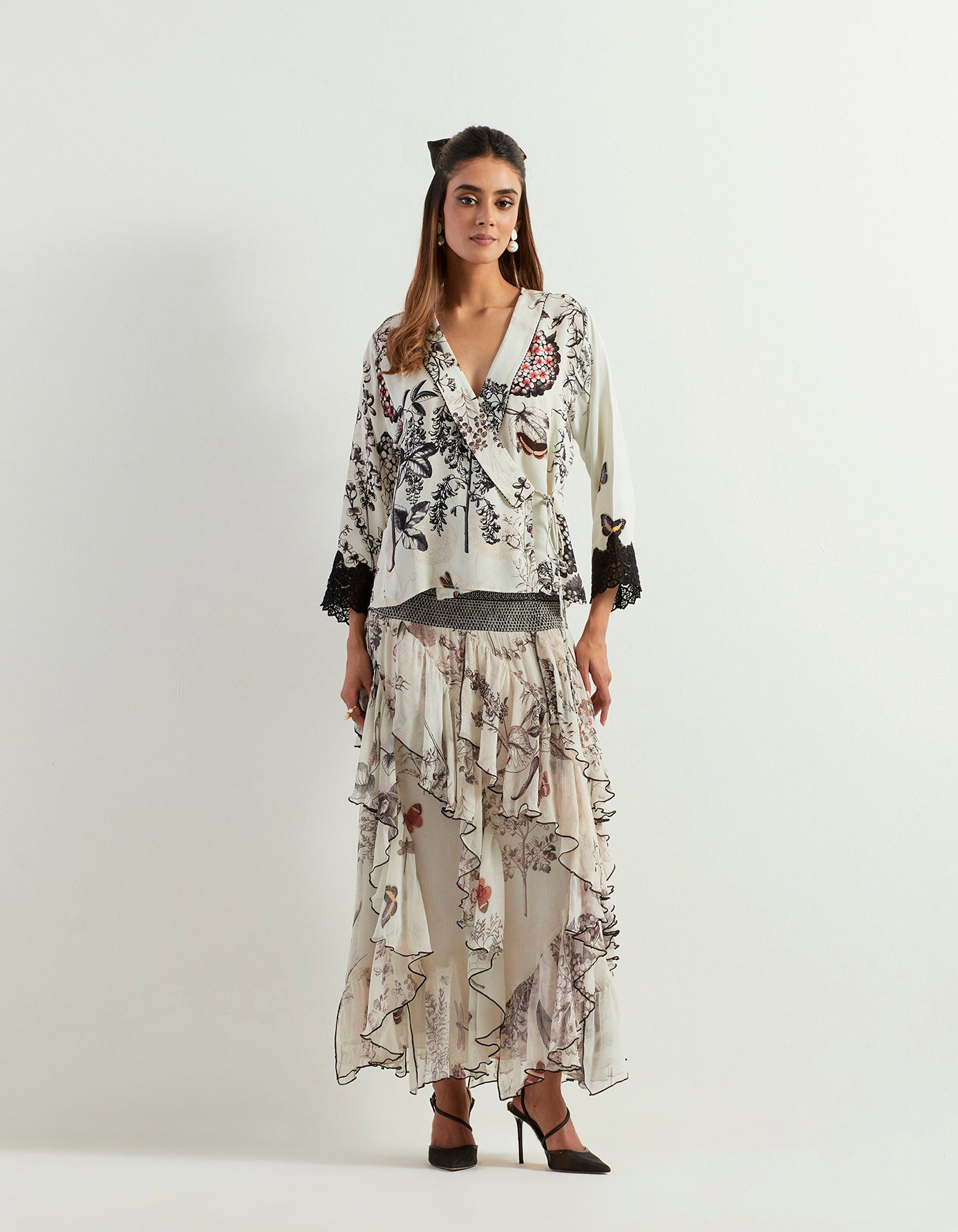 Saaya wrap top with lace detail and ruffle printed skirt with stretch waist band