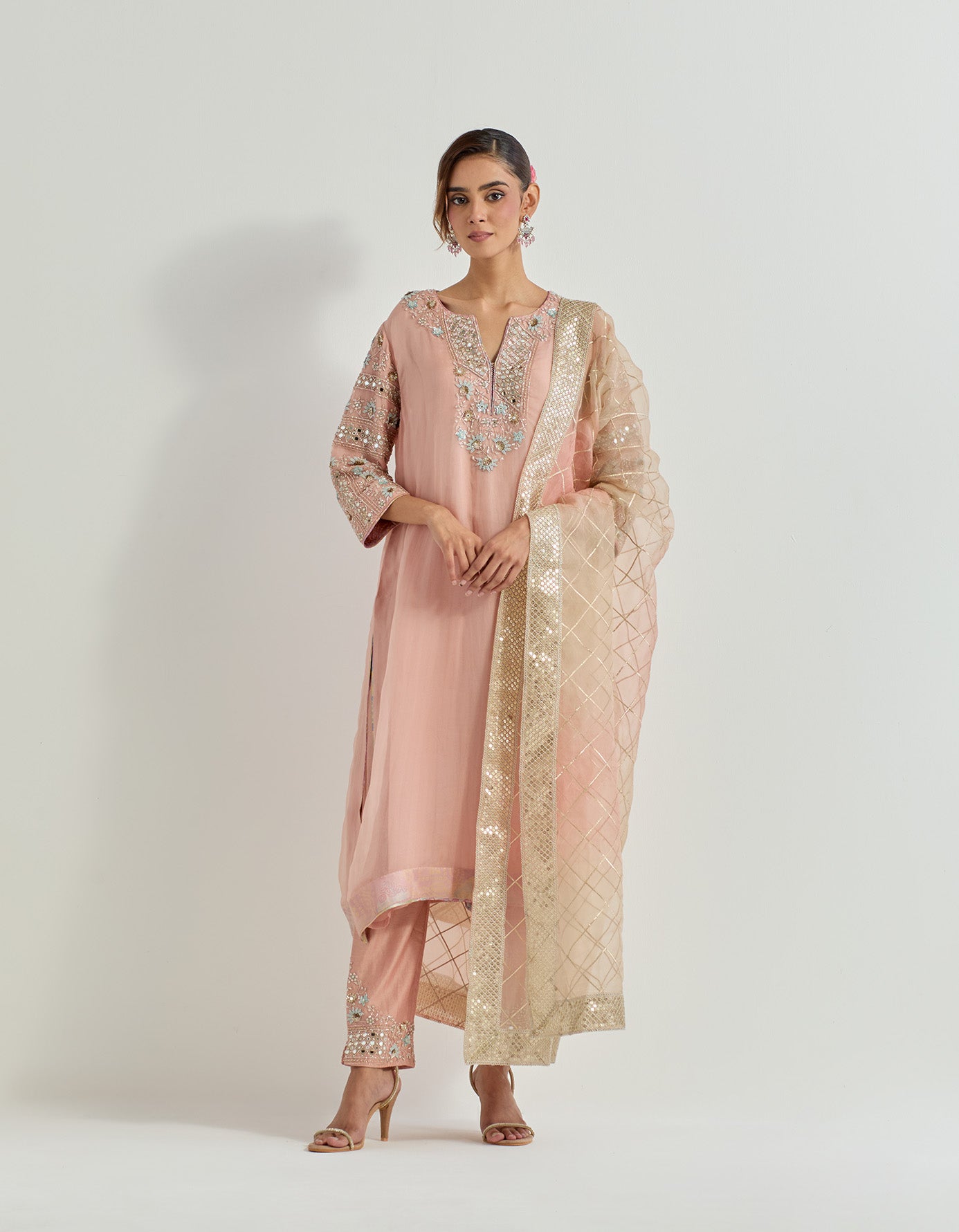 Hand embellished organza silk kurta and dupatta paired with chanderi silk pants