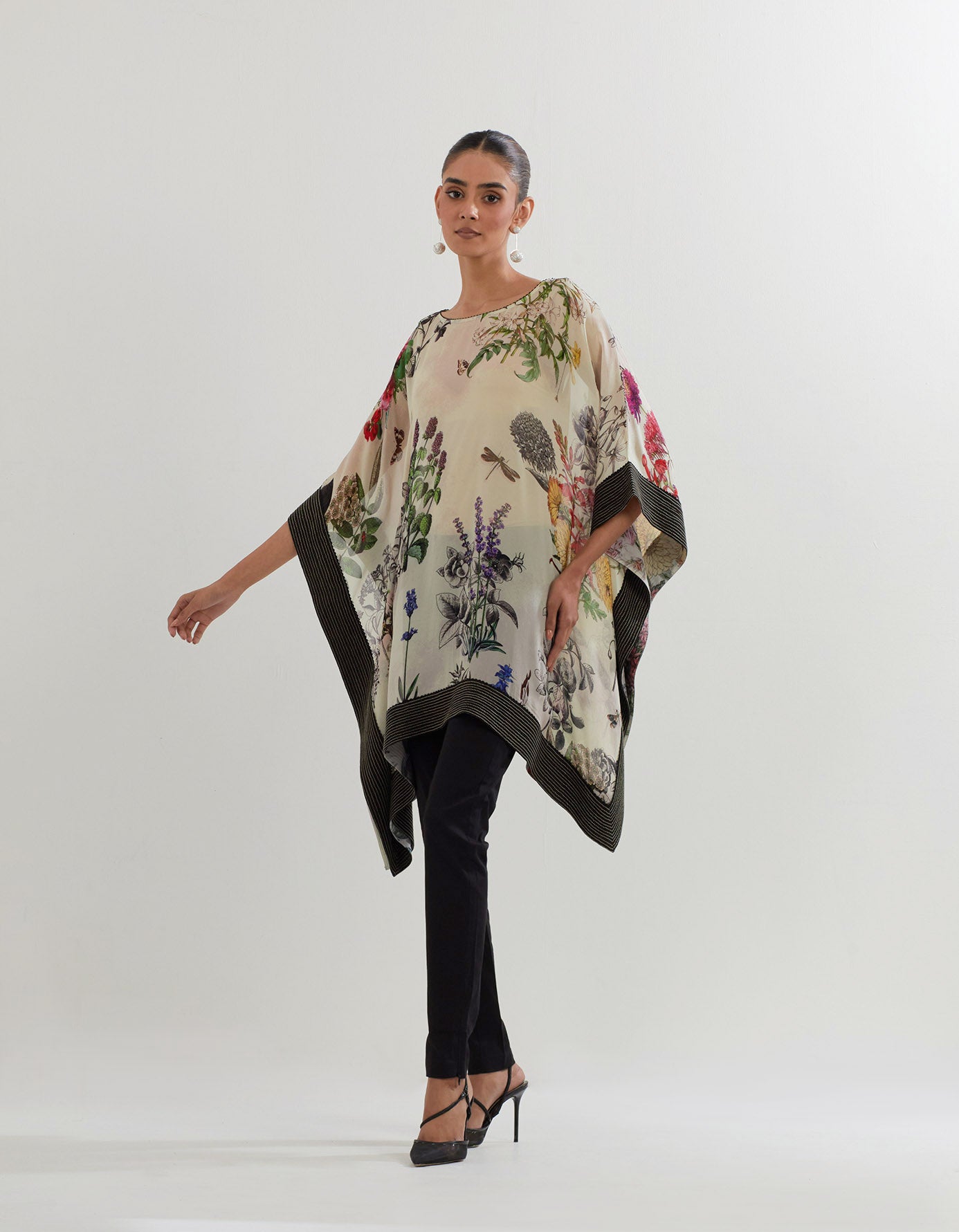 Botanical printed kaftan top paired with stretch lycra black bottom