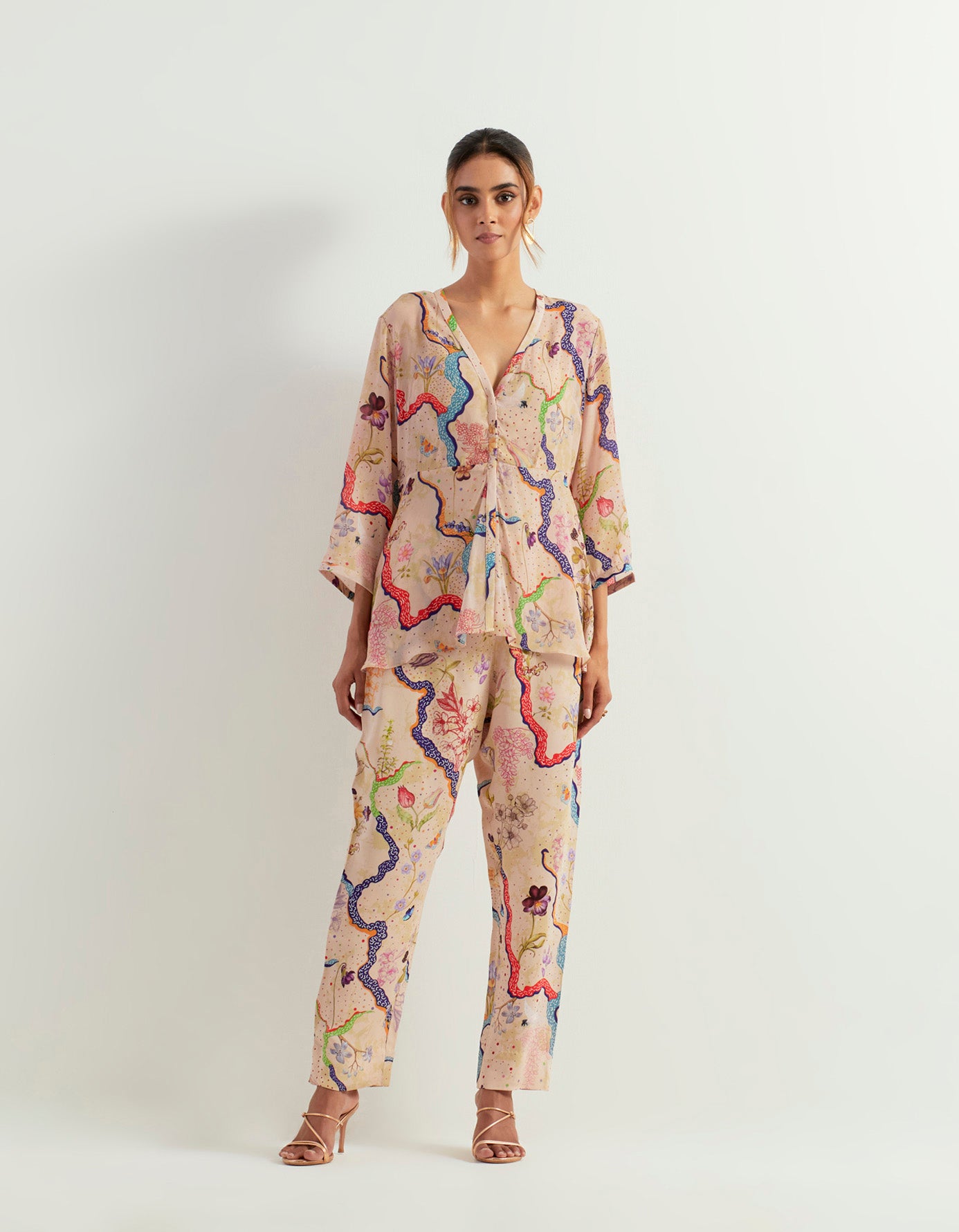 Eclectic printed peplum top with heavy georgette pants