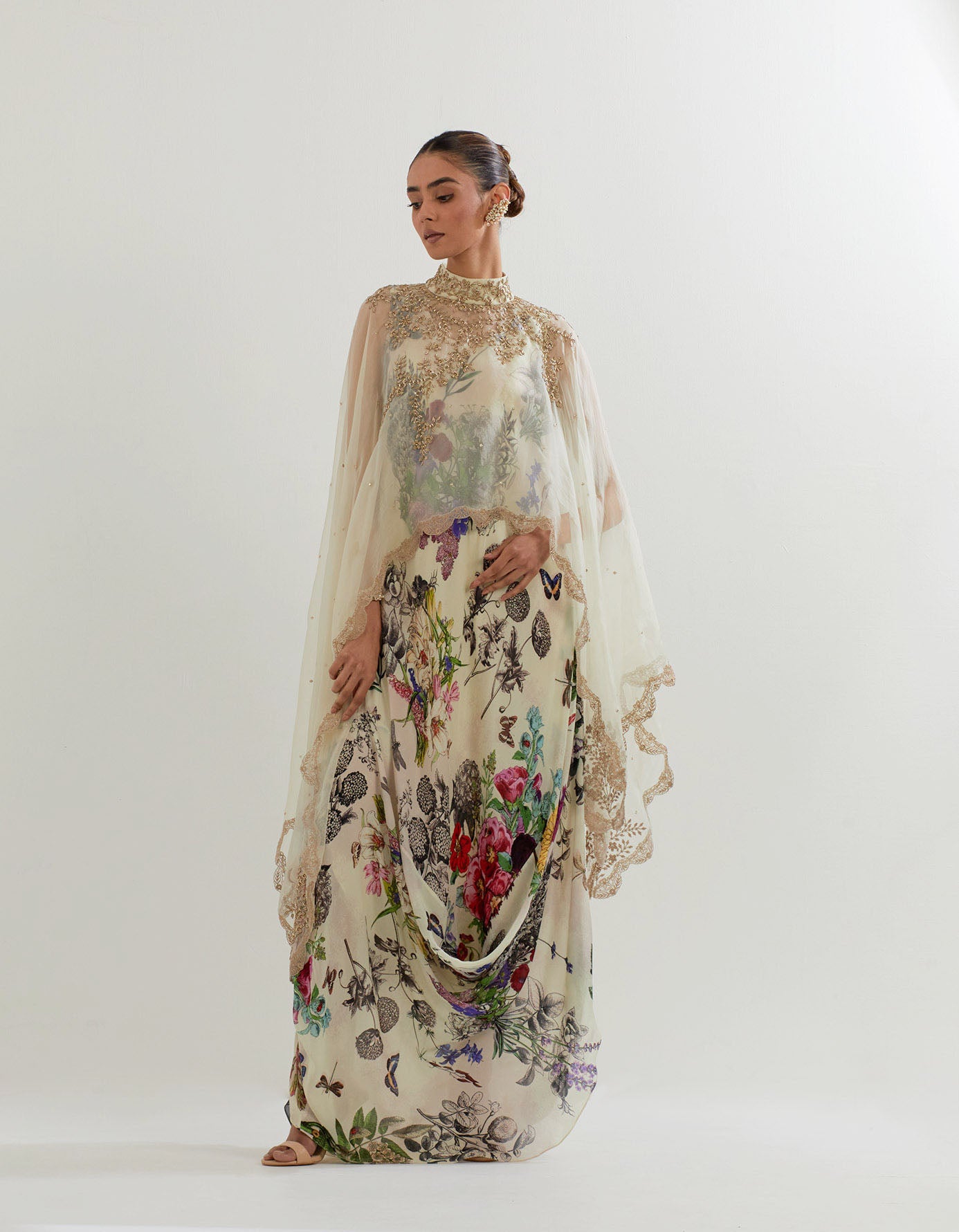 Botanica printed cowl dress paired with organza hand embellished cape