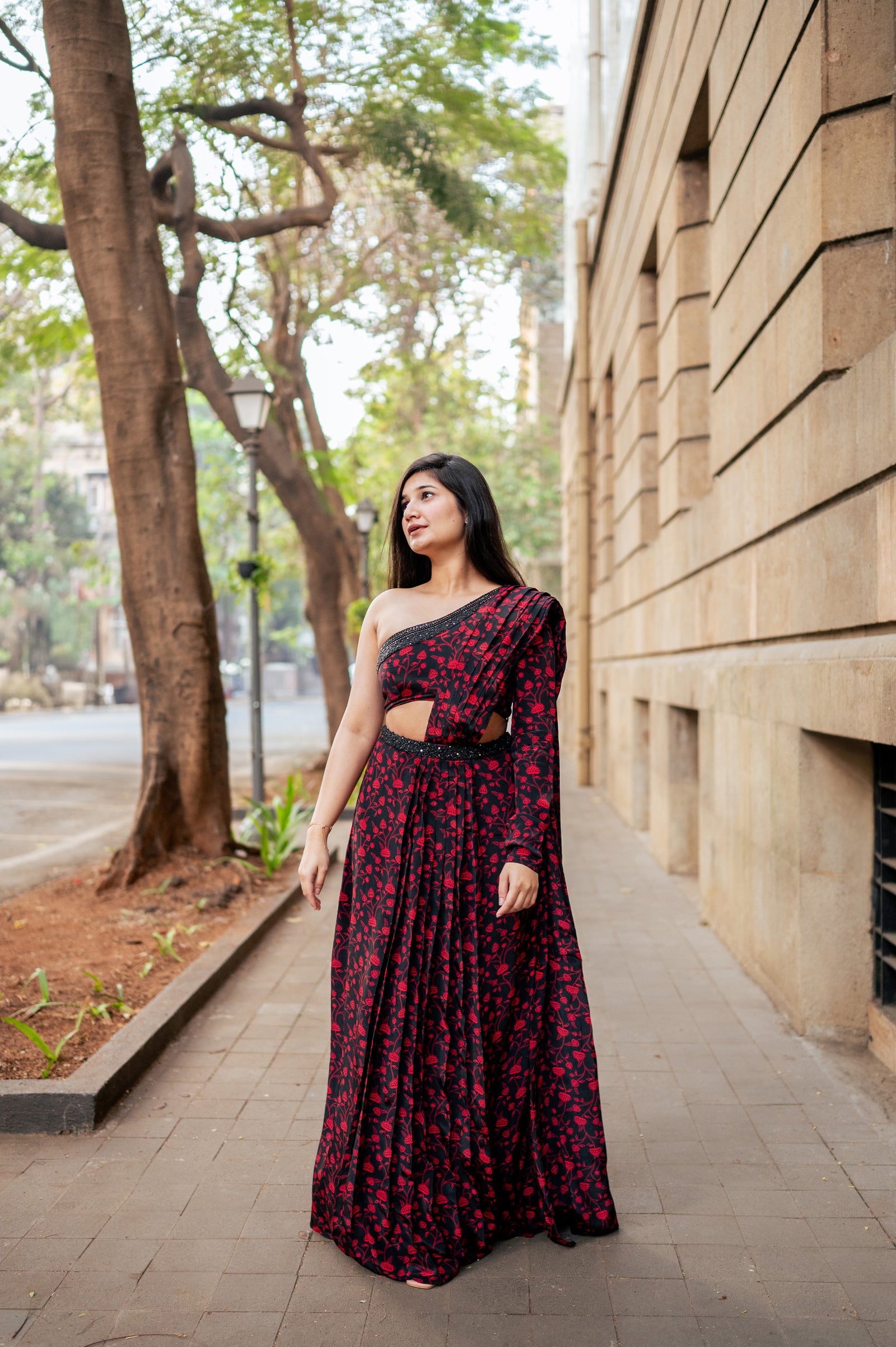 Pleated saree with one-shoulder blouse