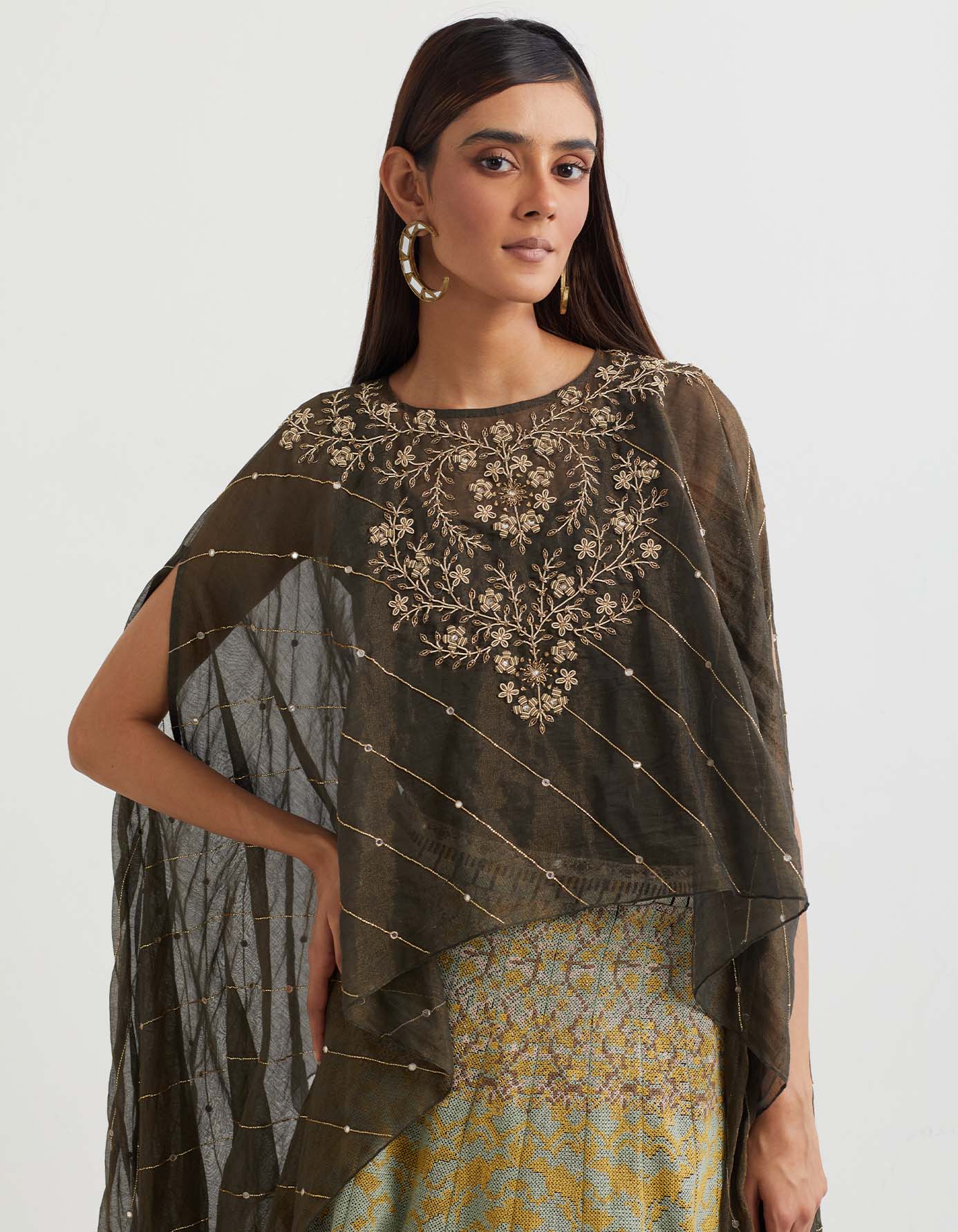 Black cross stitch embroidered skirt in landscape motif paired with tissue chanderi dupatta cape in zardozi embroidery