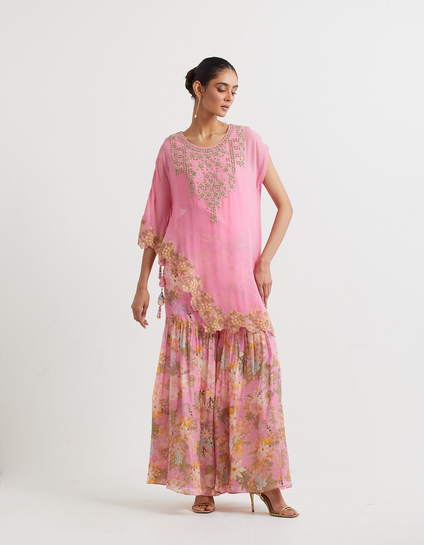Printed gathered sharara paired with asymetric hand embroidered cape