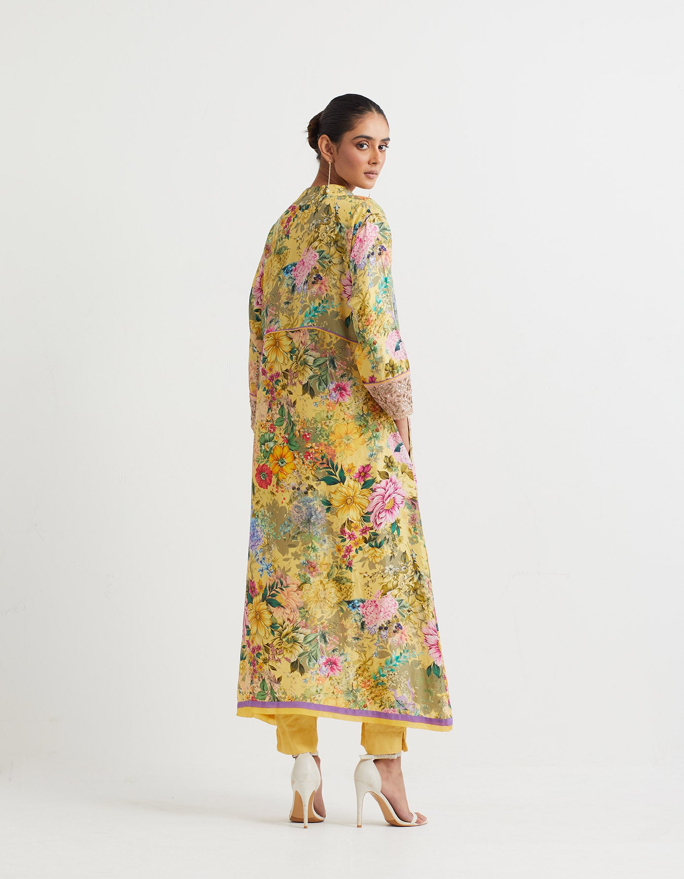 Printed pure silk a line kurta with hand embroidered  cuffs paired modal silk narrow pants.