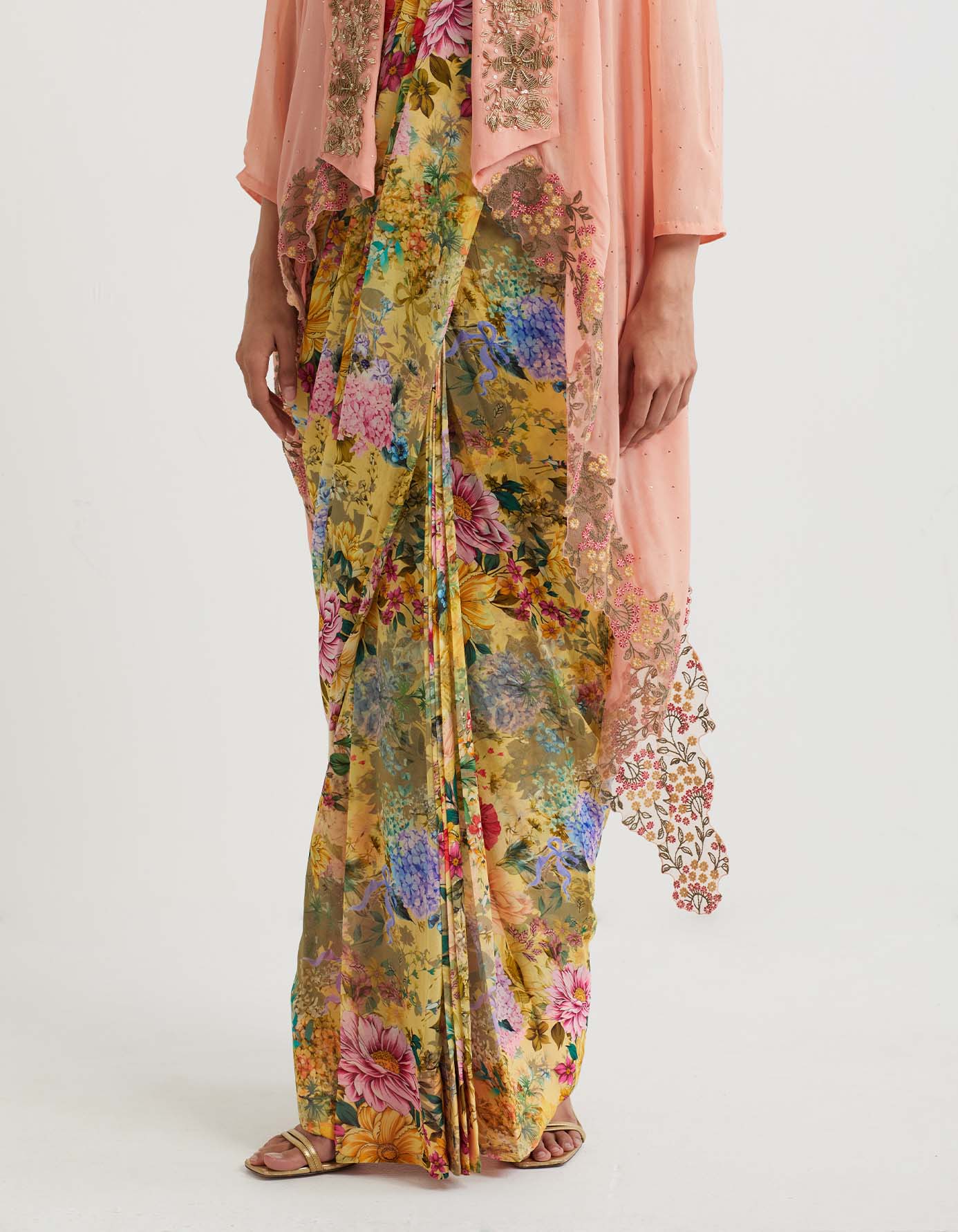 Printed pre-stitchd saree paired with shawl collar embroidered cape