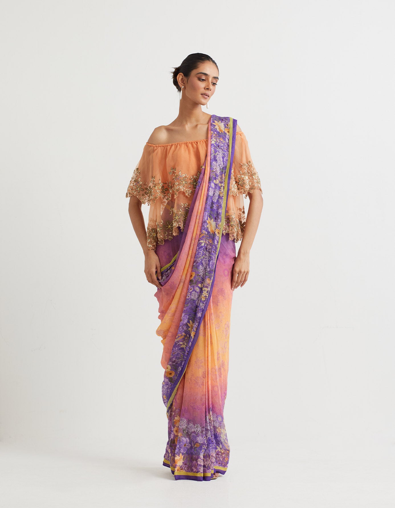 Printed pre-stitchd saree paired with organza off shoulder double layered cape in zardozi embroidery