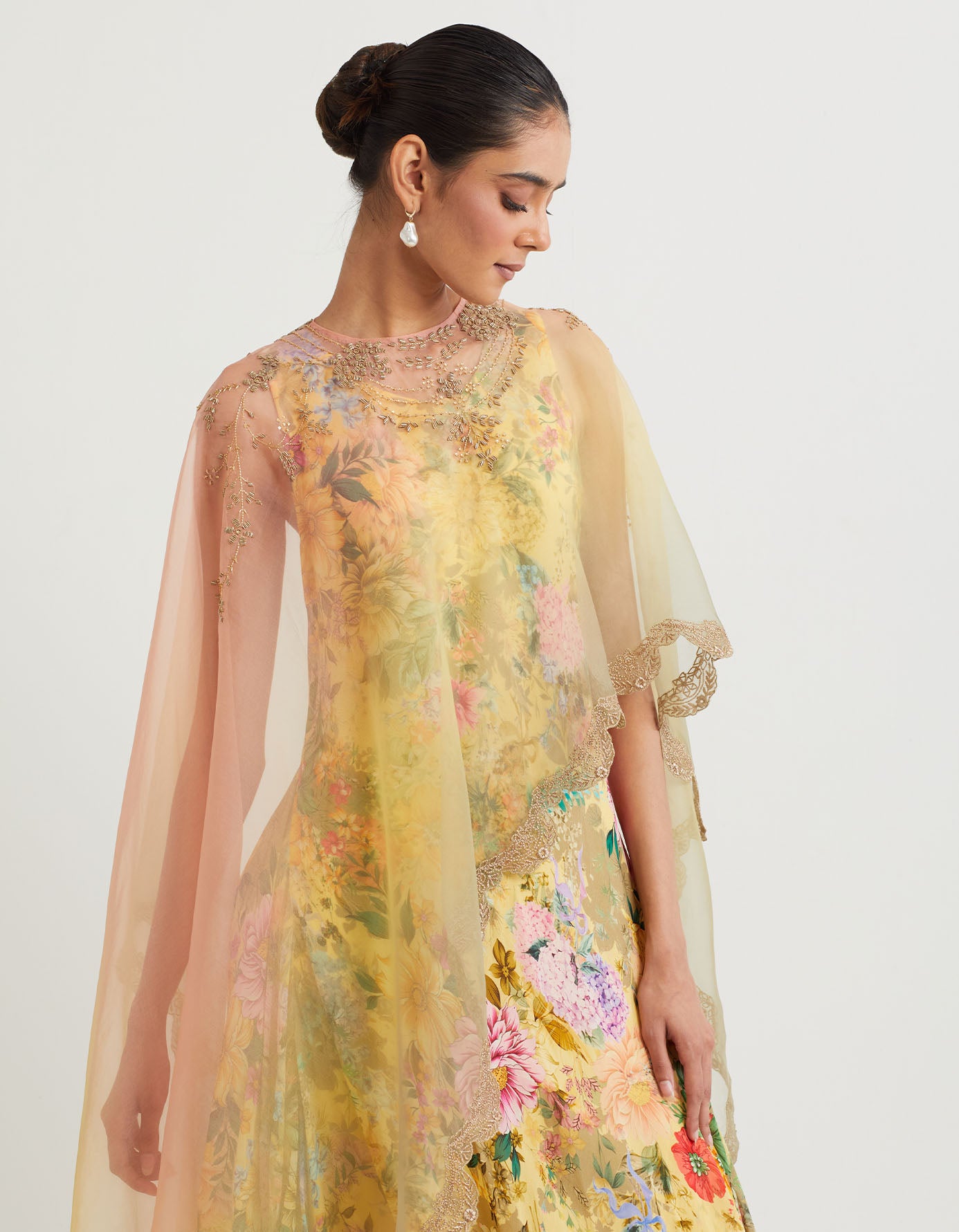 printed cowl dress paired with ombre dupatta cape with hand embroidery and gold zari scallop border
