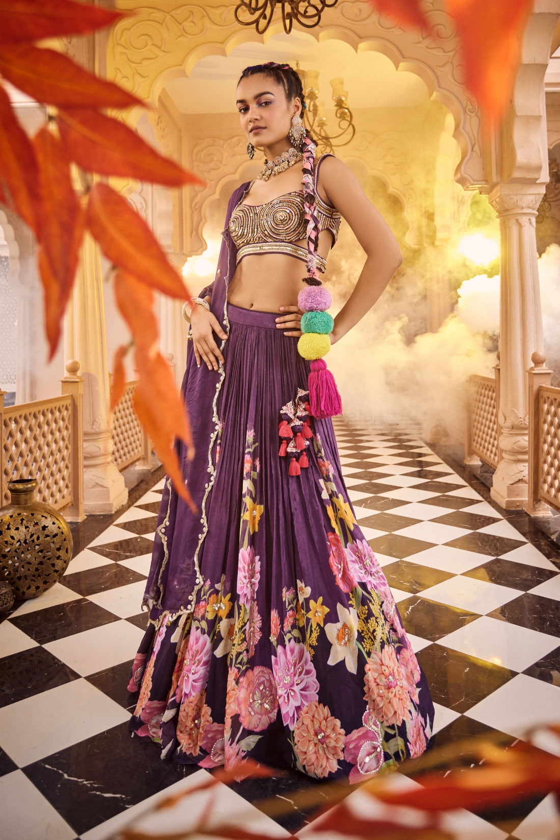 A Purple Floral Printed Embroidered Lehenga Set Combined With Heavy Embroidered Blouse And Dupatta.