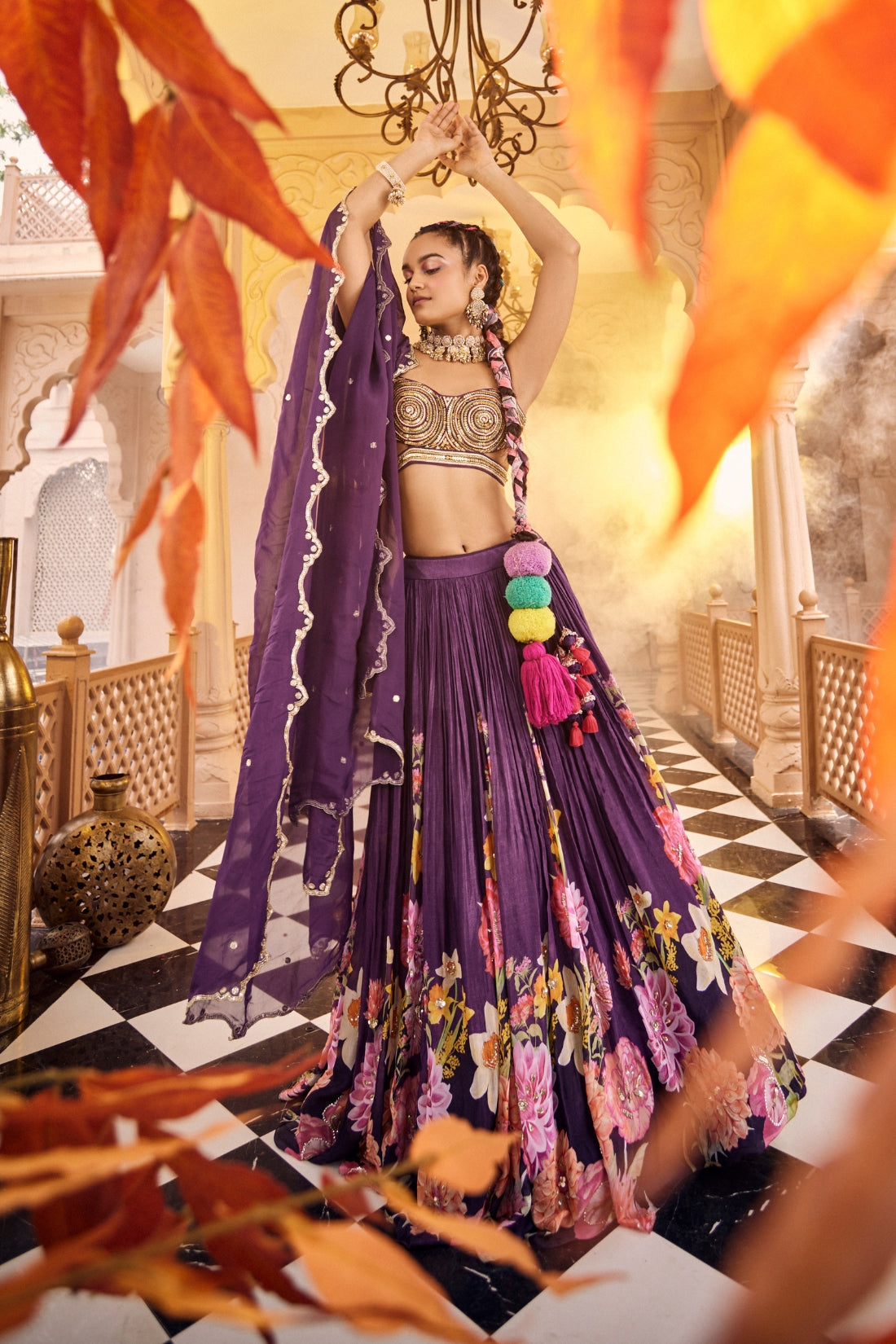 A Purple Floral Printed Embroidered Lehenga Set Combined With Heavy Embroidered Blouse And Dupatta.
