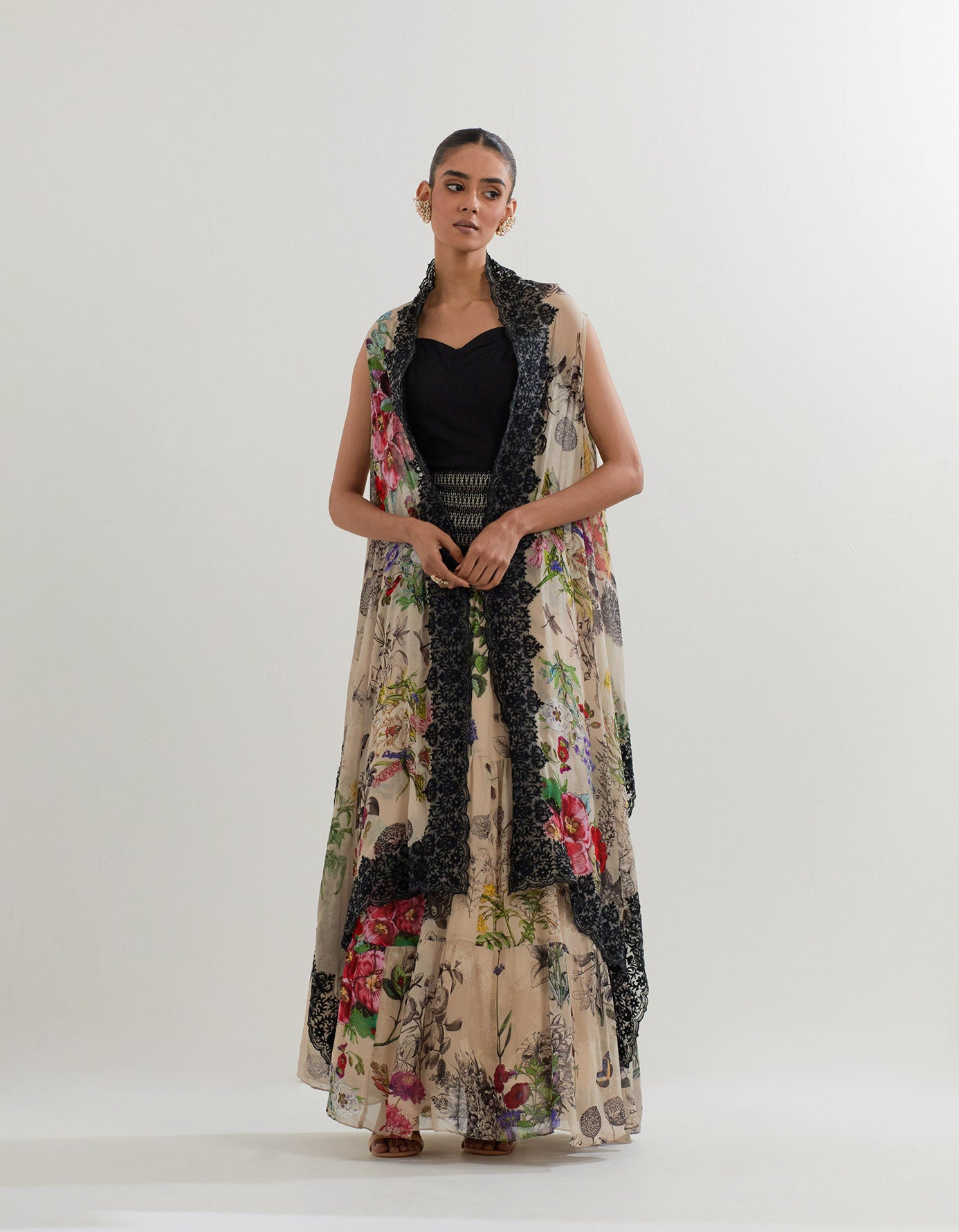 Botanical printed cape paired with stretch inner and printed skirt