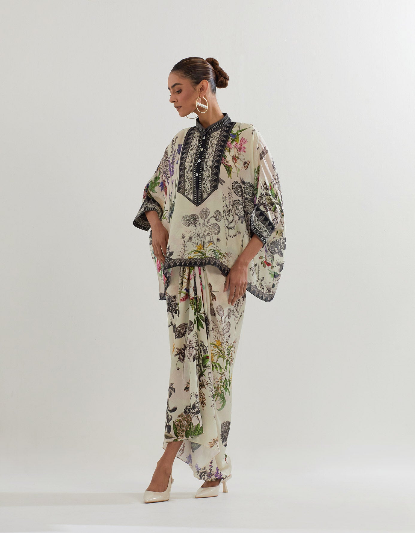 Botanical printed kaftan top paired with drape skirt