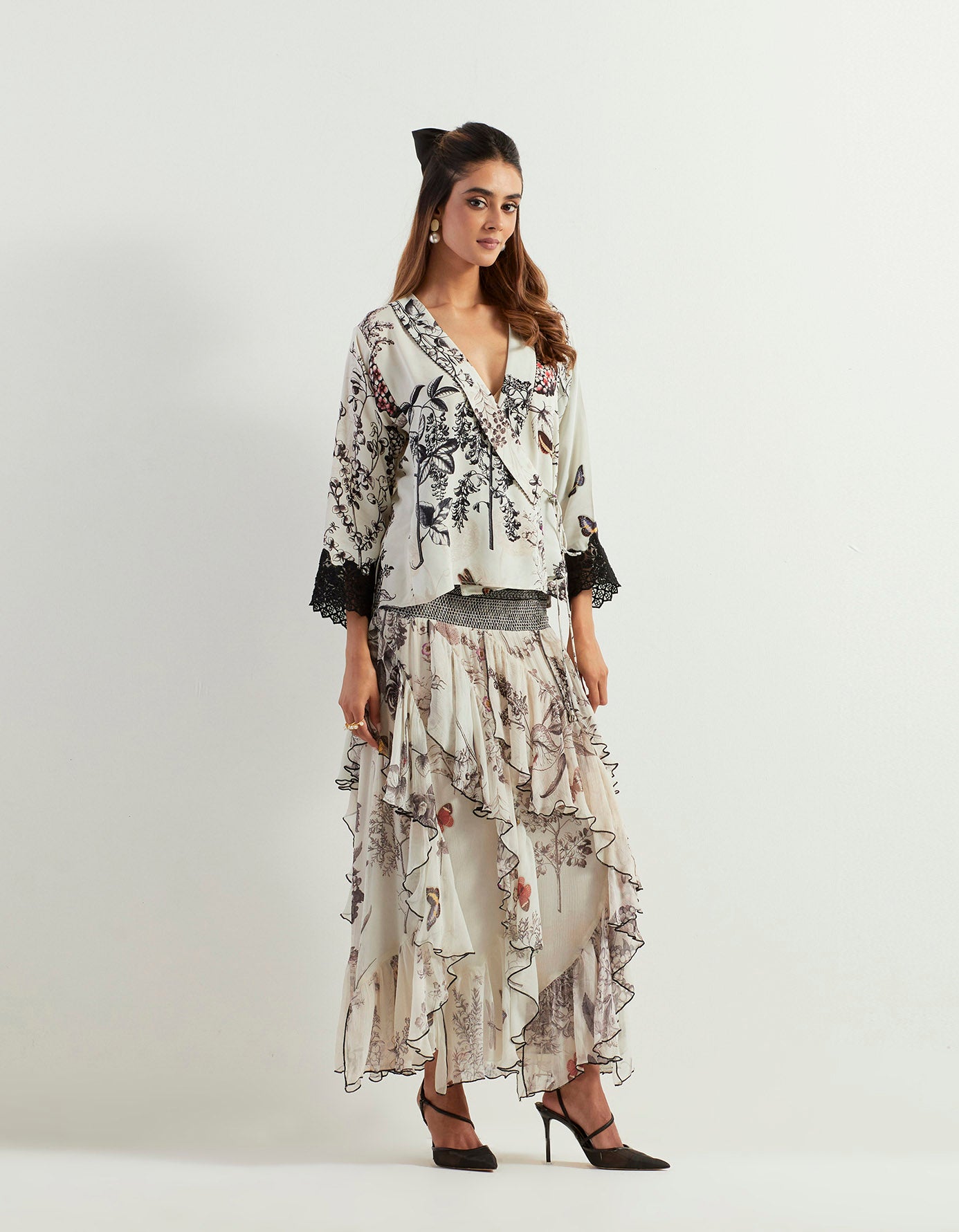 Saaya wrap top with lace detail and ruffle printed skirt with stretch waist band