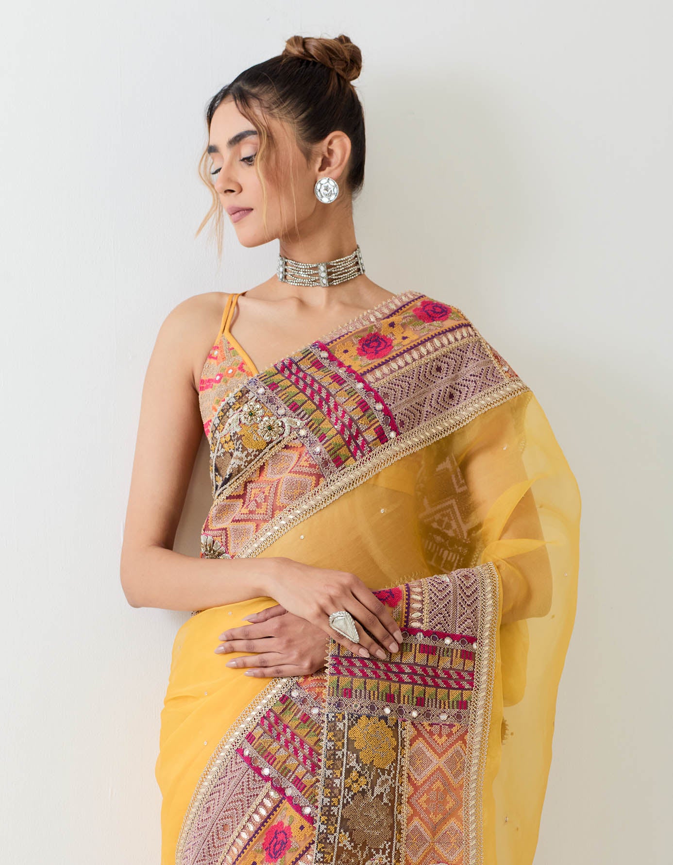 Mustard yellow patch work blouse and saree