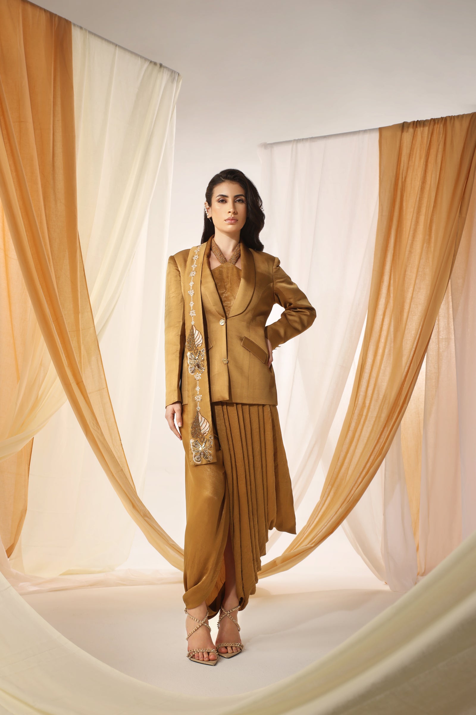 Blazer Teamed Up With a Draped Skirt and Bustier