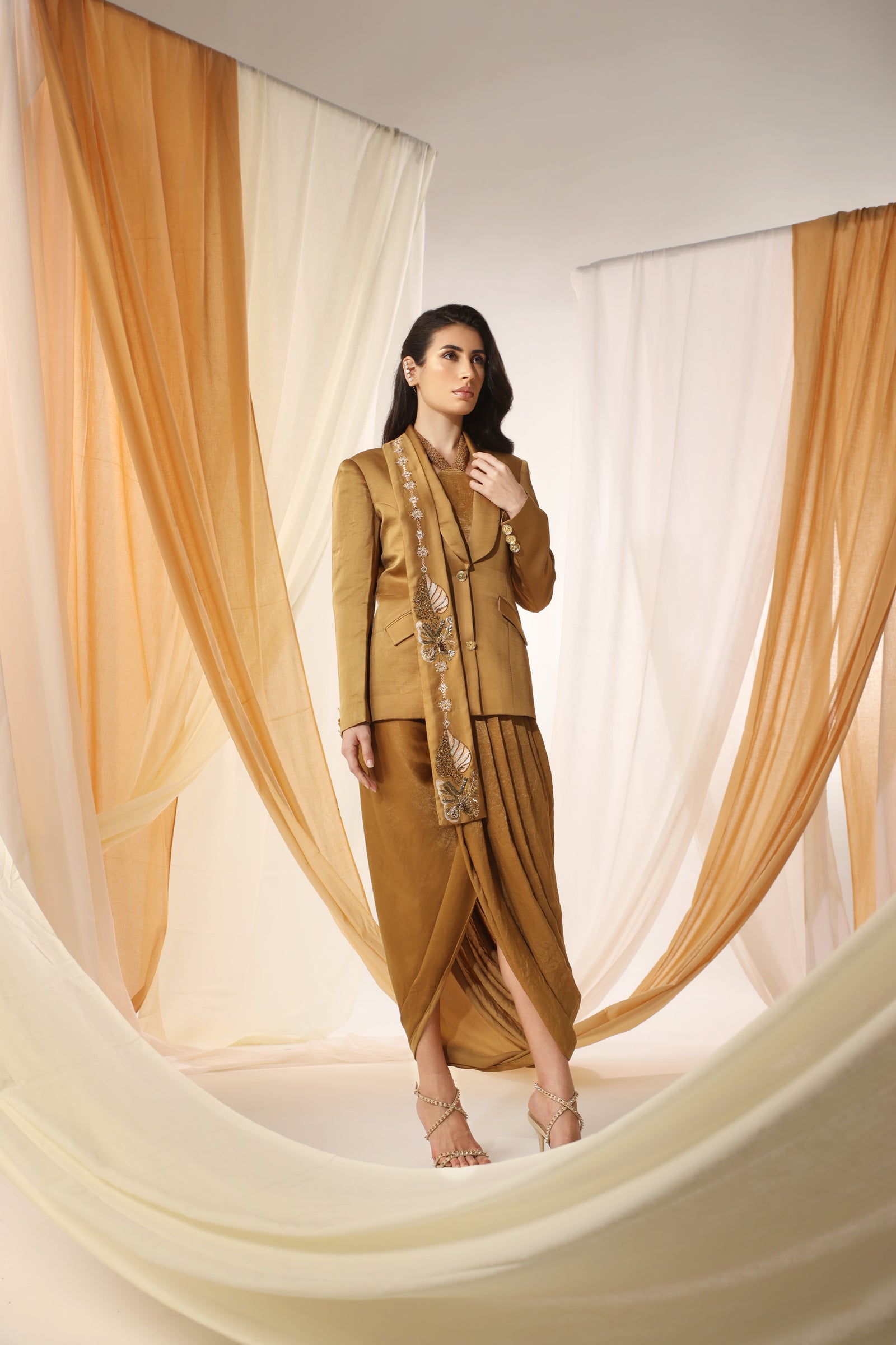 Blazer Teamed Up With a Draped Skirt and Bustier