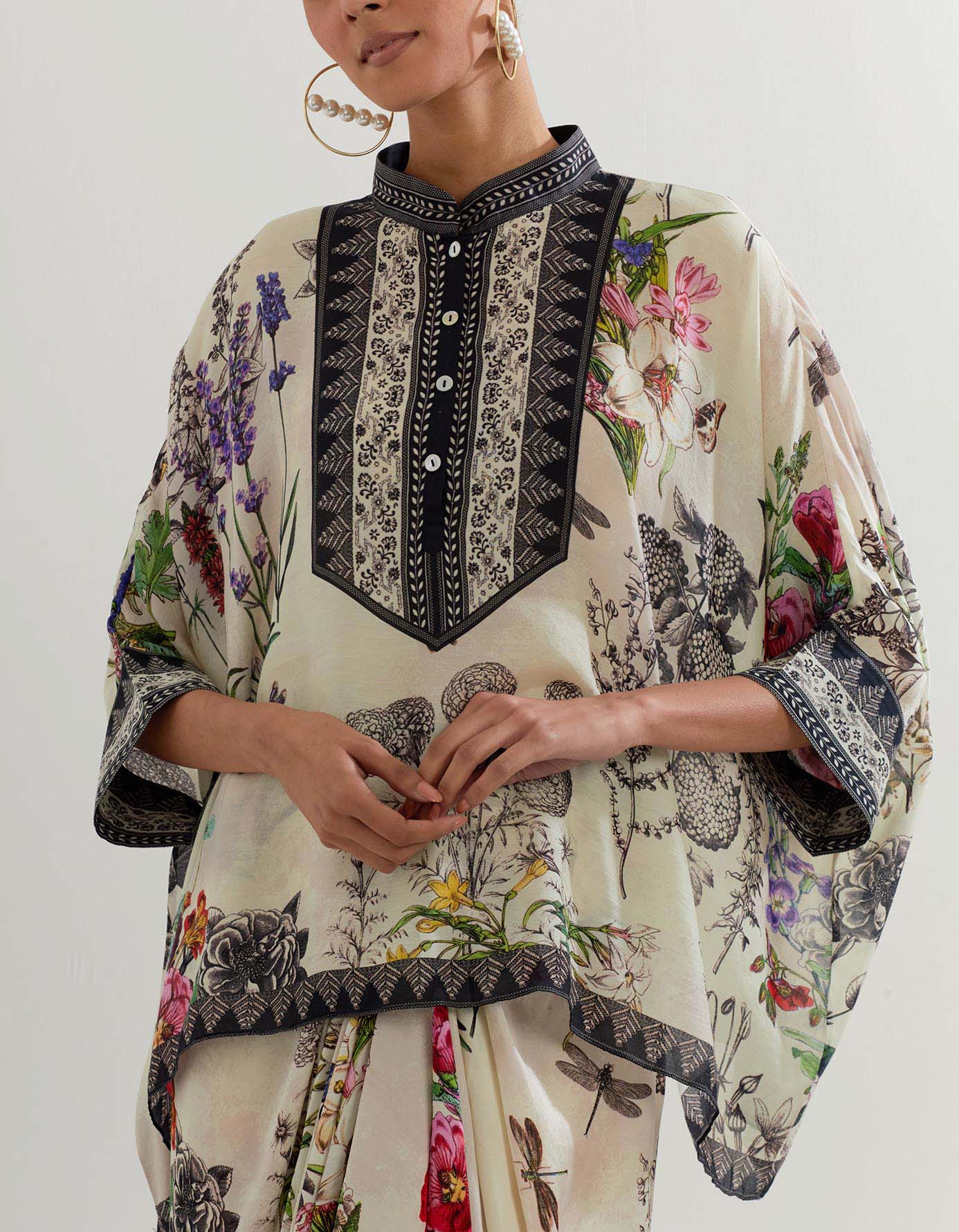 Botanical printed kaftan top paired with drape skirt