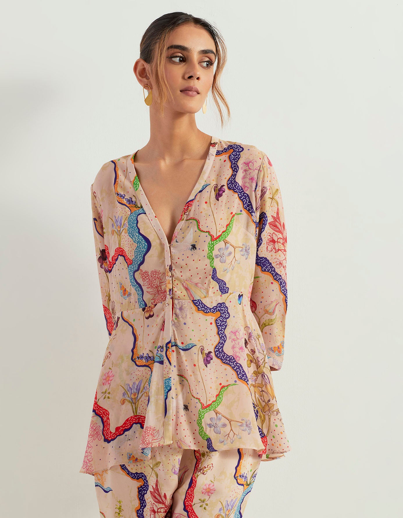 Eclectic printed peplum top with heavy georgette pants