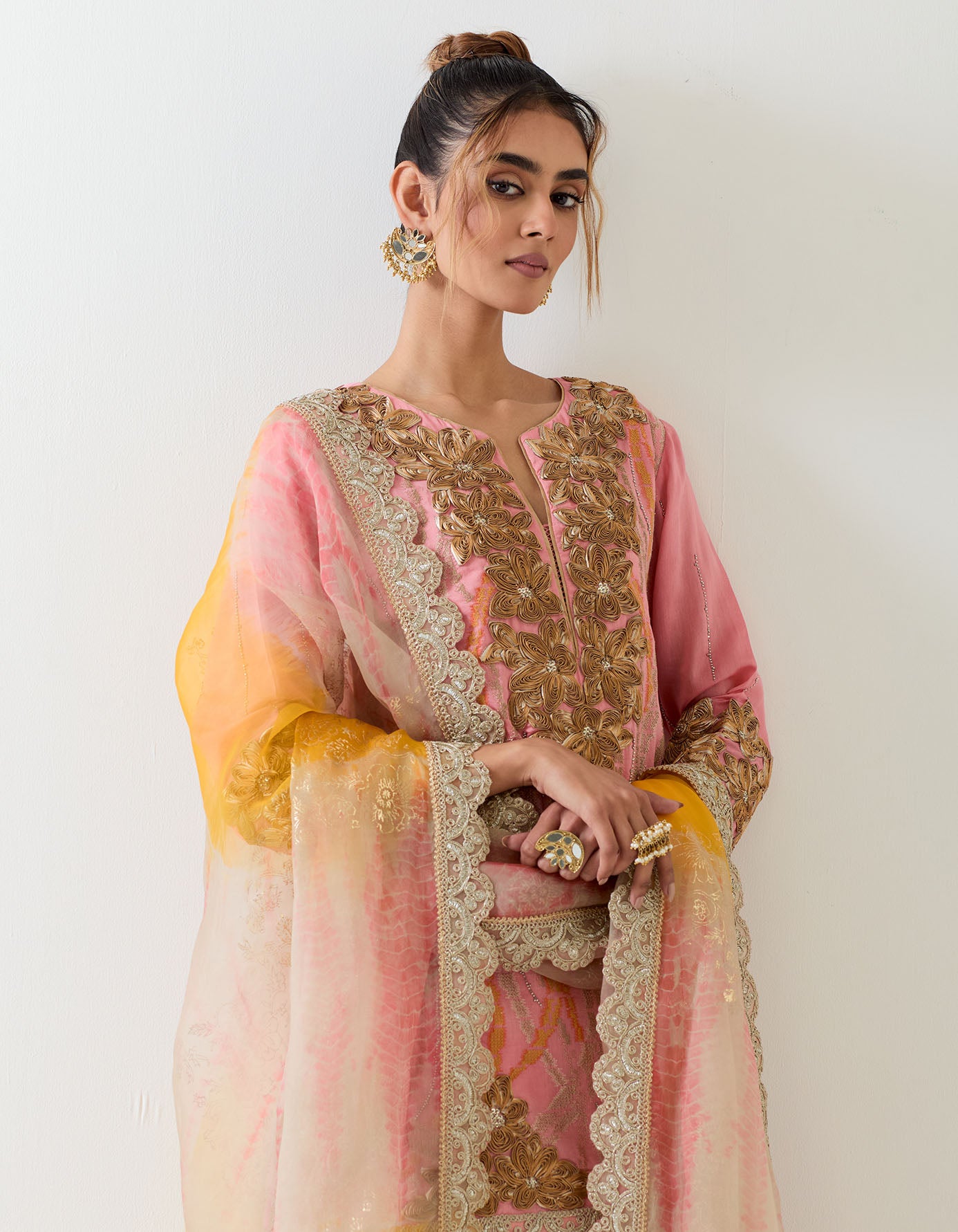 Chanderi silk embroidered kurti top paired with pleated sharara and organza tie dye dupatta