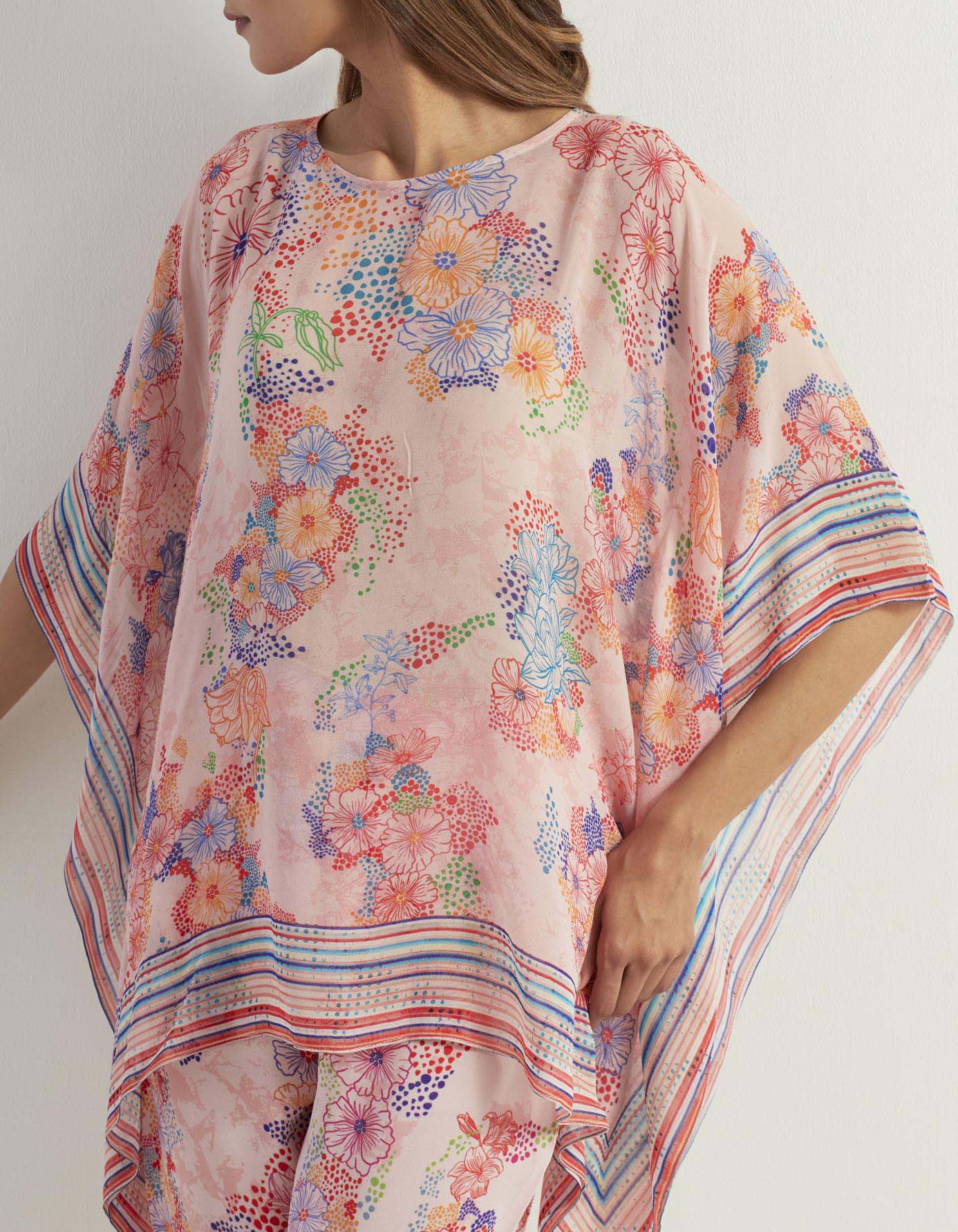 Printed poncho top with heavy georgette pants