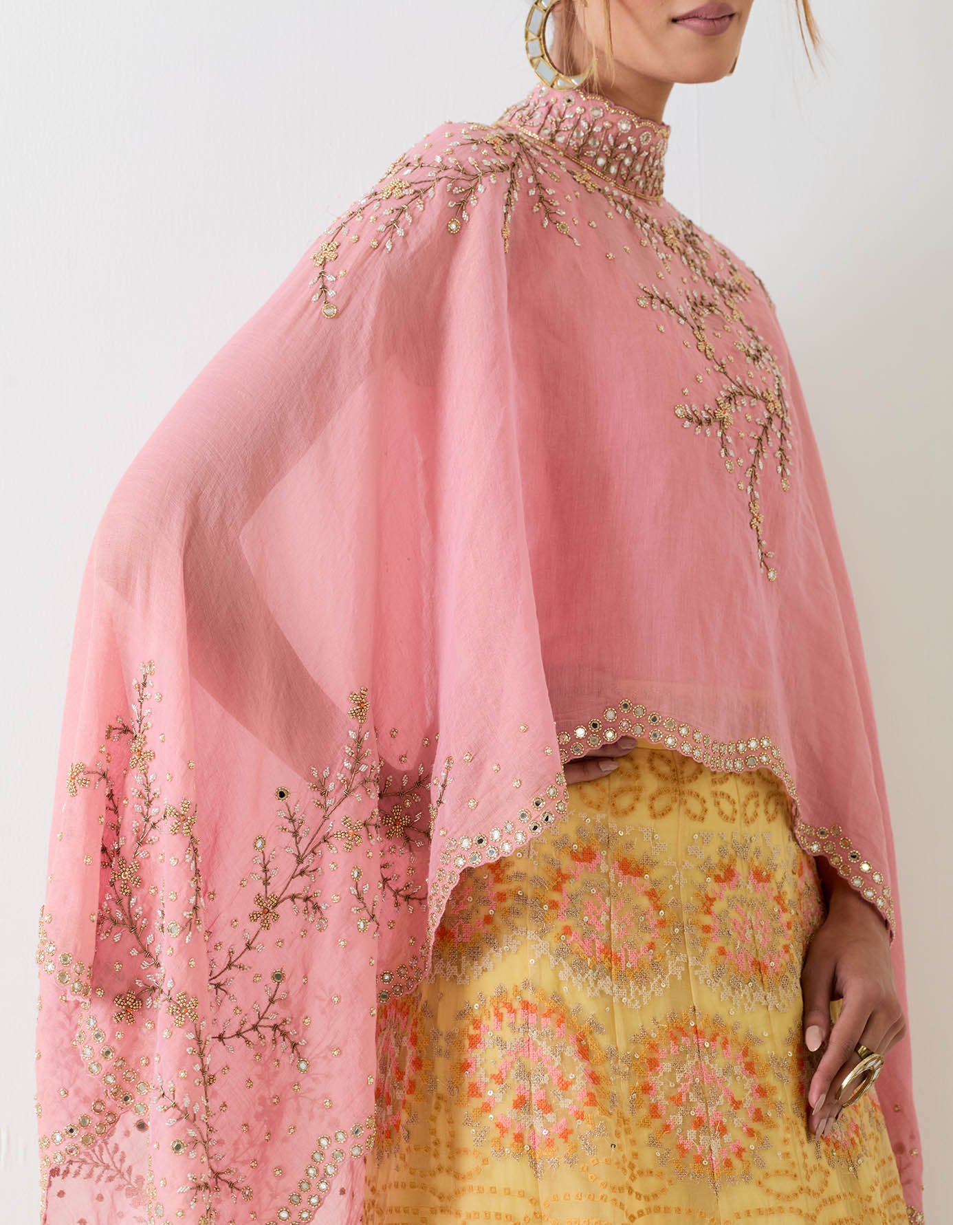 Organza hand embellished cape paired with cross stitch embroidered organza skirt