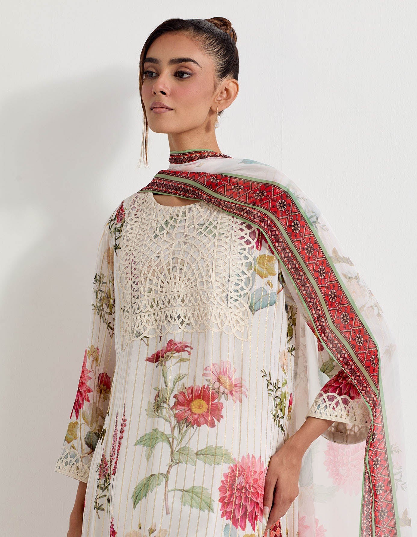 Daisy printed lurex georgette kurta with lattice work and cross stitch embroidery paired with stretch lycra pants and orgazna dupatta