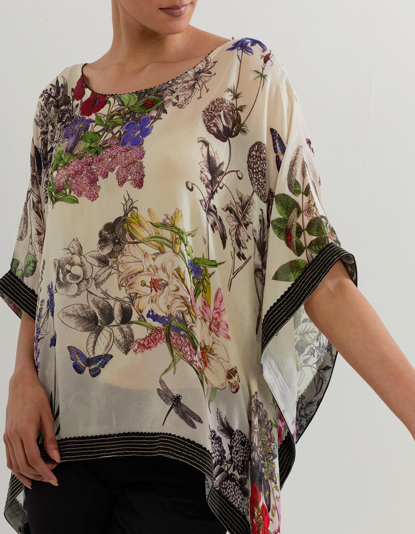 Botanical printed kaftan top paired with stretch lycra black pants