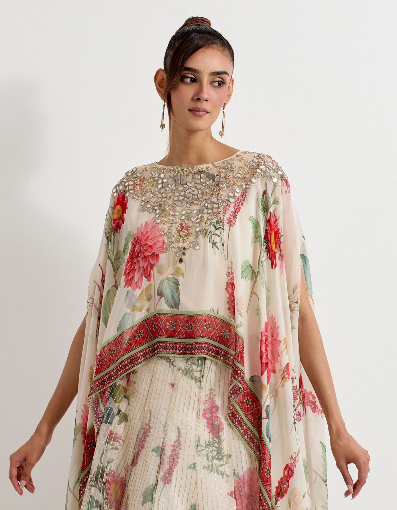 Daisy printed organza skirt with tissue border paired with georgette dupatta cape in mirror embroidery