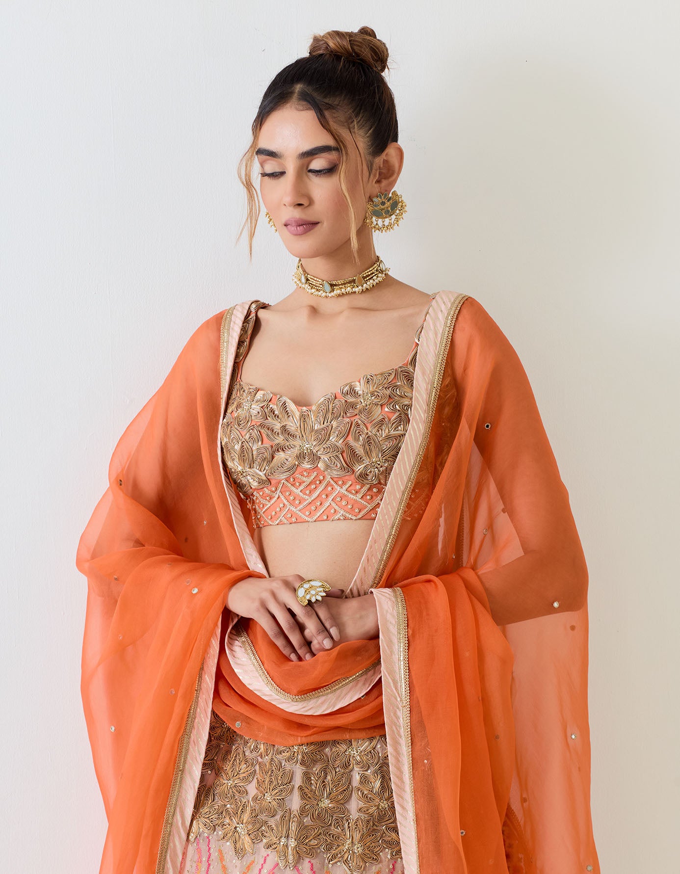 Organza silk lehnga set in gota, mirror and cross stitch embroidery