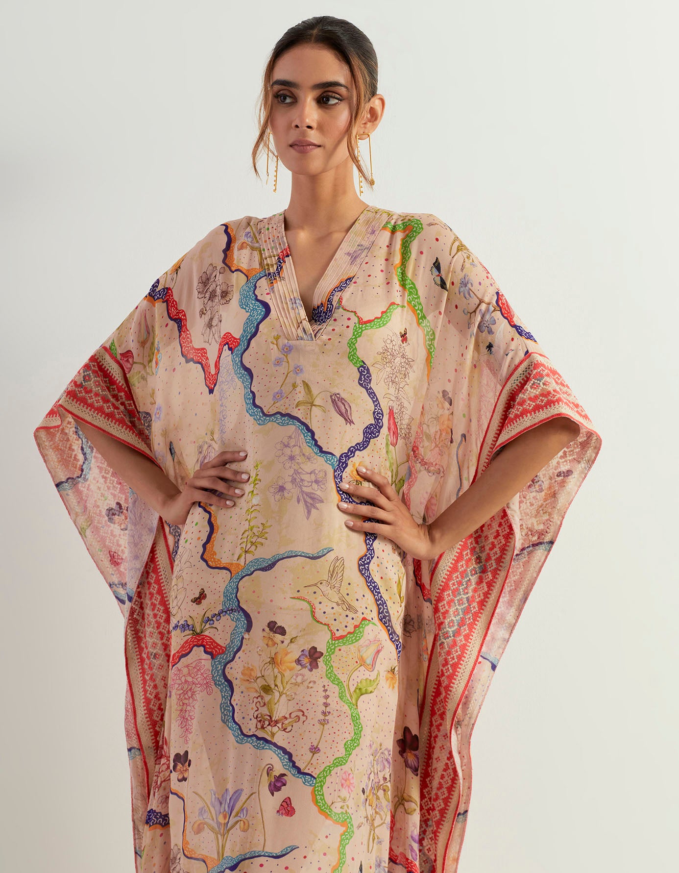 Eclectic printed kaftan with cross stitch embroidered border