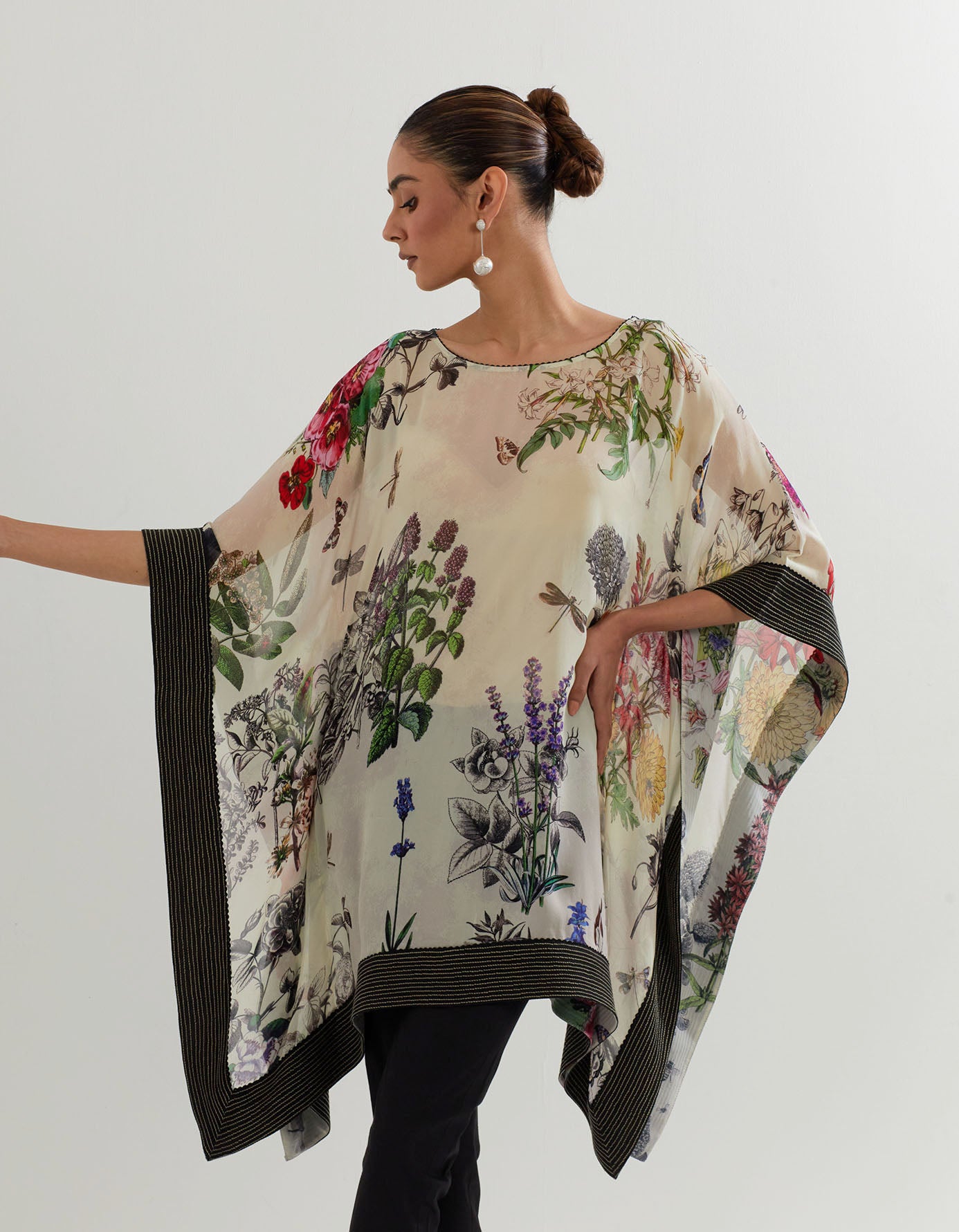 Botanical printed kaftan top paired with stretch lycra black bottom