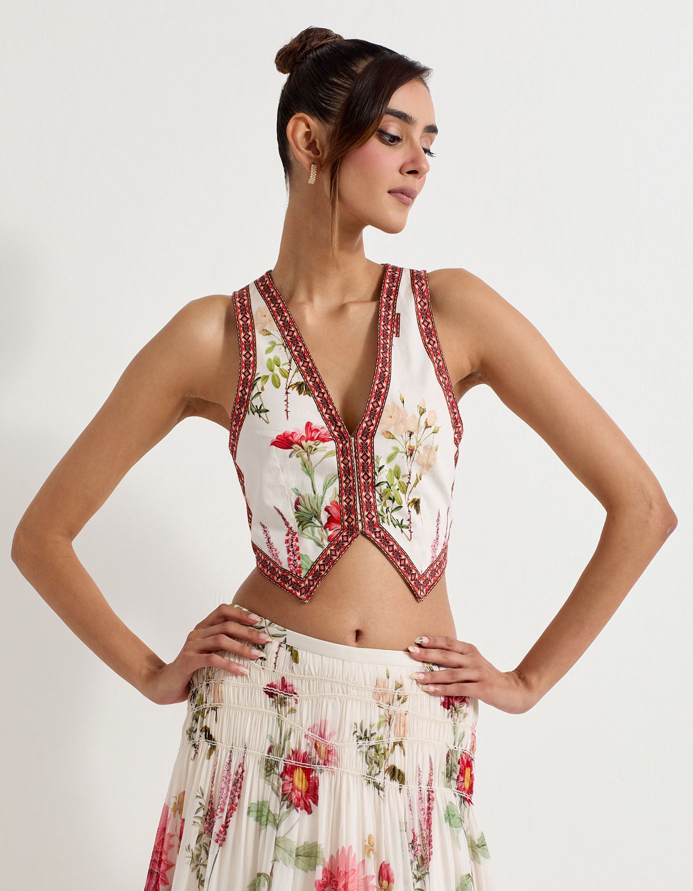 Daisy printed stretch lycra waist coat paired with georgette tiered skirt and elasticated rouched waist band