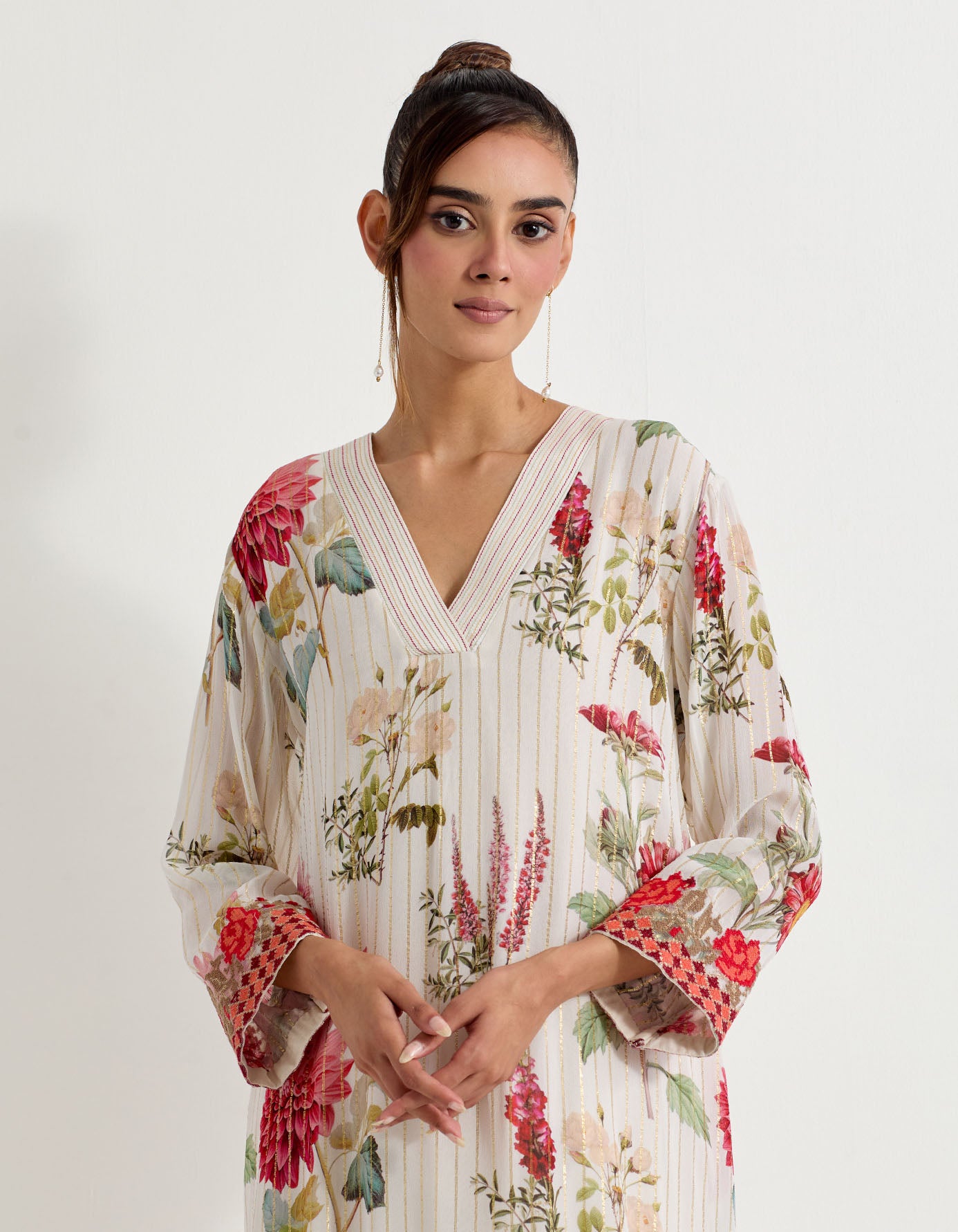 Daisy printed lurex georgette kurta with cross stitch border paired with stretch lycra pants