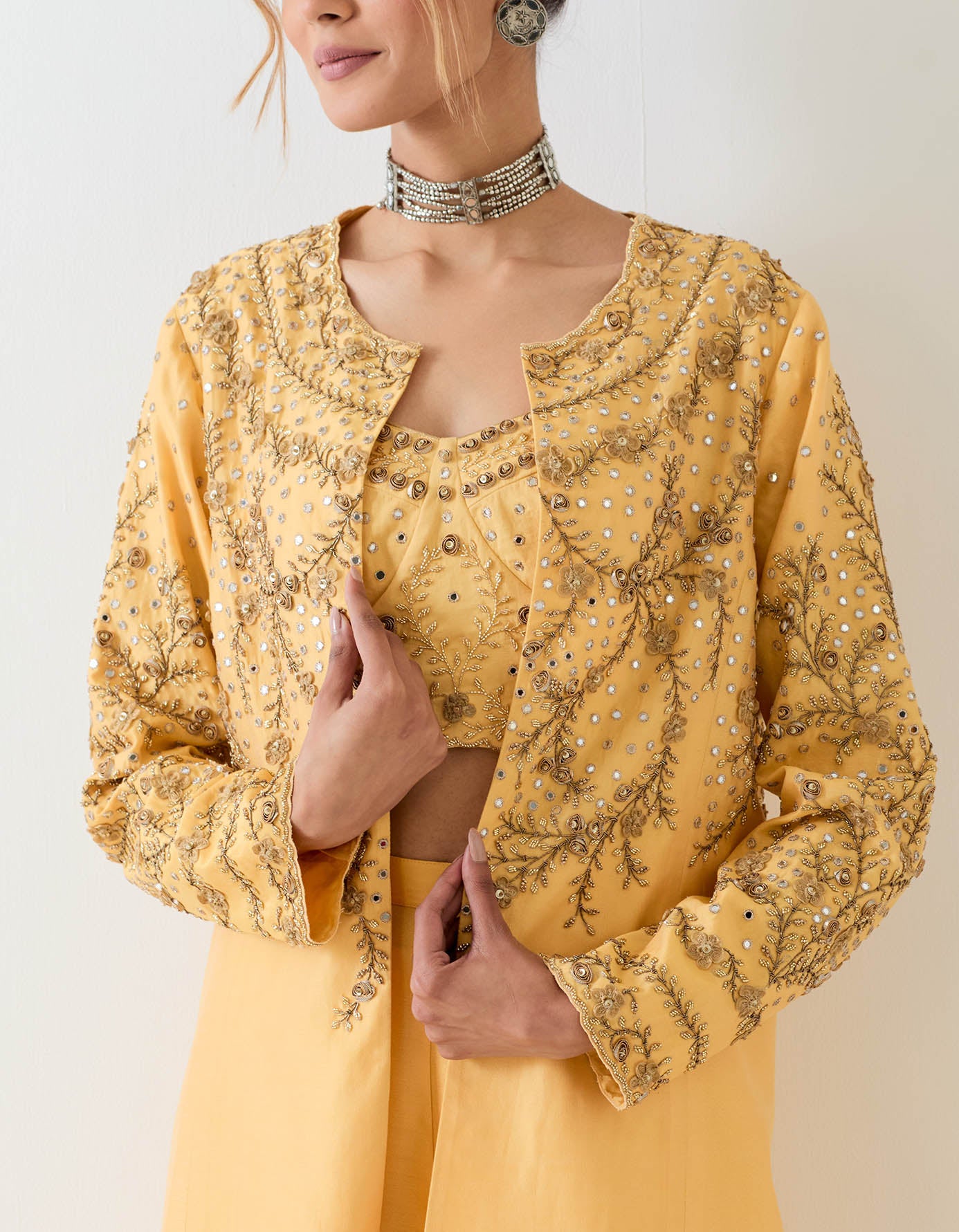 Chanderi silk long jacket and stretch bustier paired with pleated pants