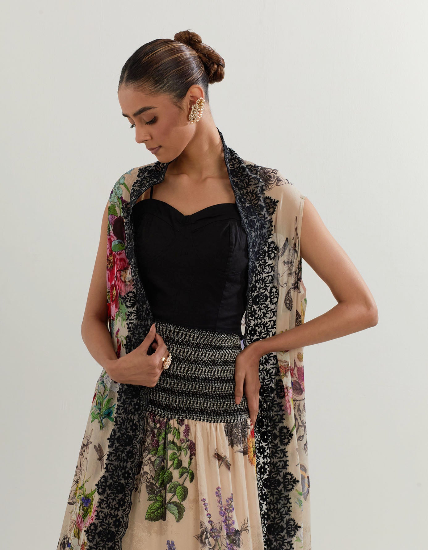 Botanical printed cape paired with stretch inner and printed skirt