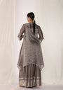 Embroidered Silk Kurta Paired With Woven Border Pants And  Tissue Assymetric Cape.