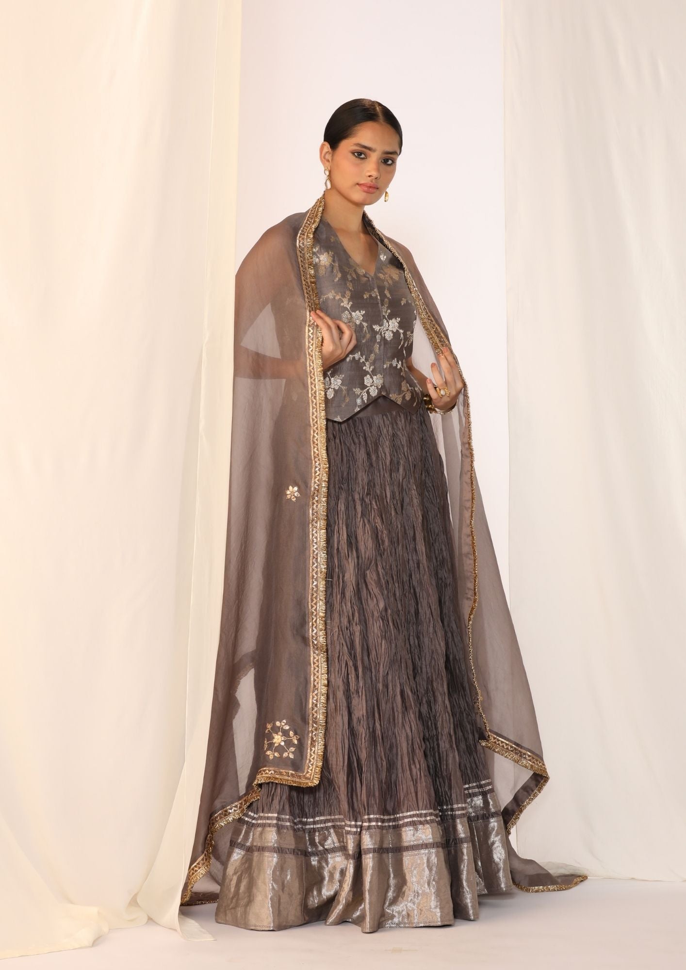 Brocade Waistcoat Paired With A Crushed Skirt With Organza Dupatta With Gota Work